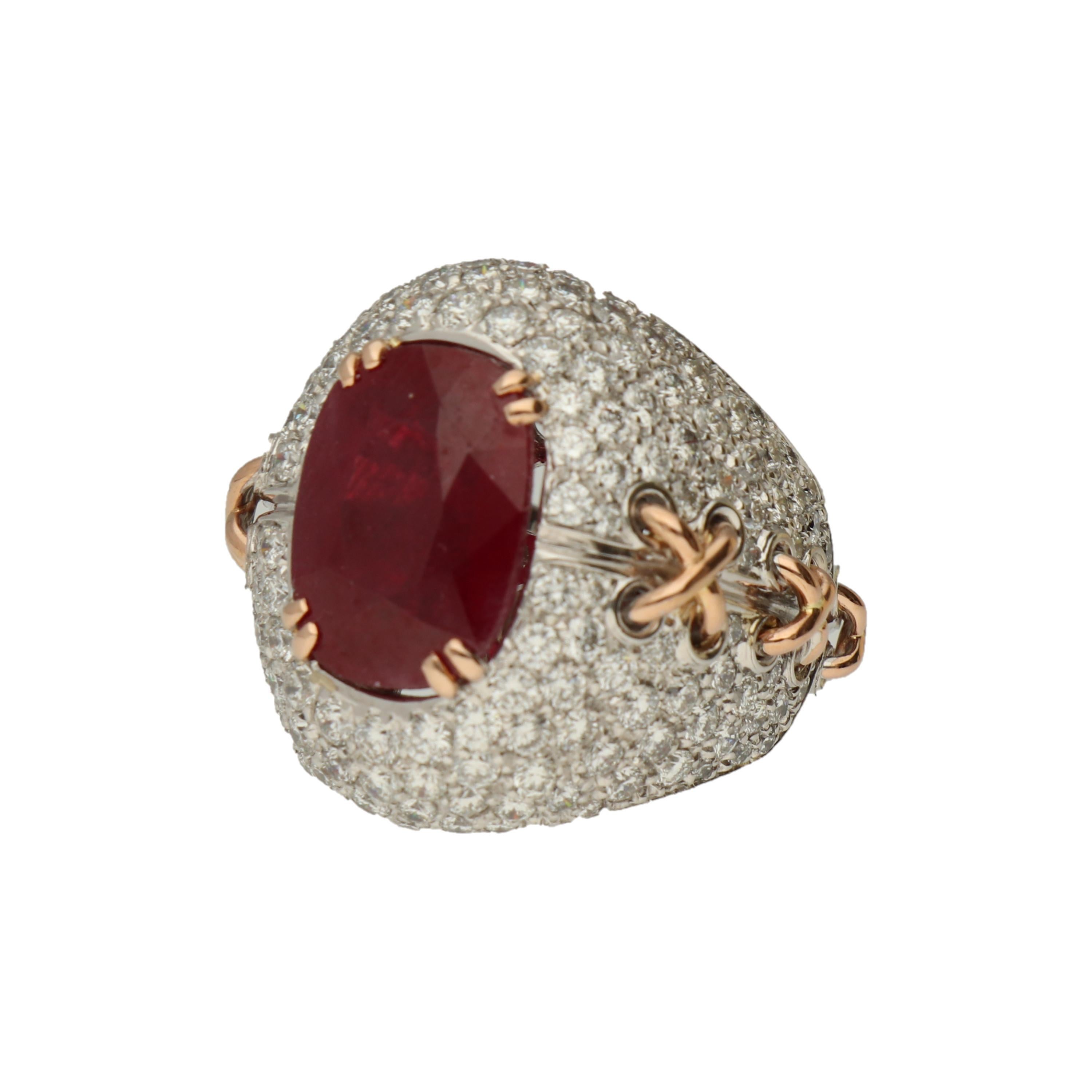 A ruby and pave diamonds mounted in an 18K White and Yellow Gold Cocktail Ring, belonging to the Rinaldo Gavello Desert collection, UNICO model.

Ruby is defined as red corundum. The presence of chromium is largely what makes a corundum gemstone