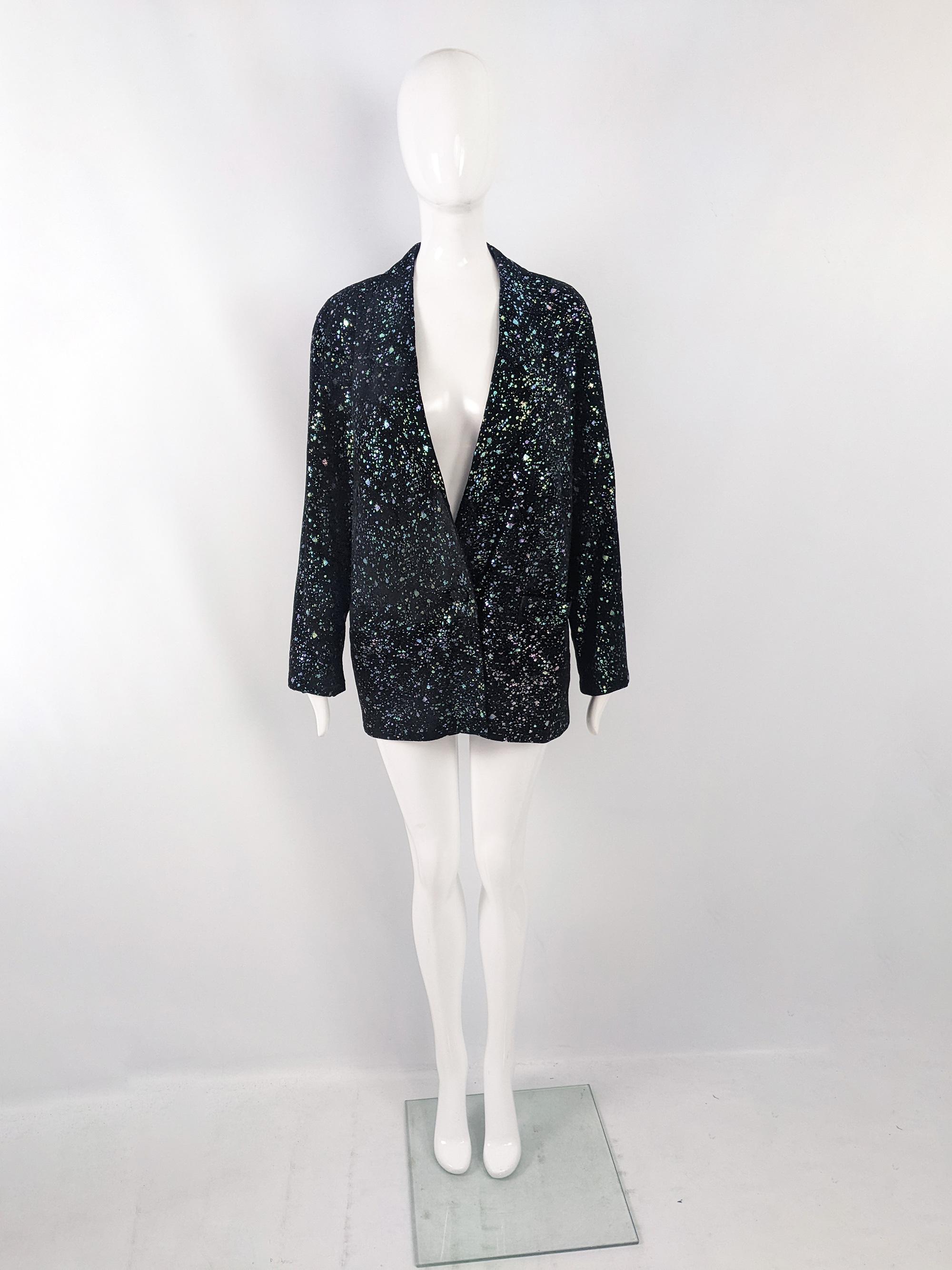 An incredible and rare vintage womens suede jacket from the 80s by quality British fashion leatherwear designer, Gavin Brown. In a black suede with an incredible metallic splatter print throughout and an oversized, boxy fit.

Size: Marked vintage UK
