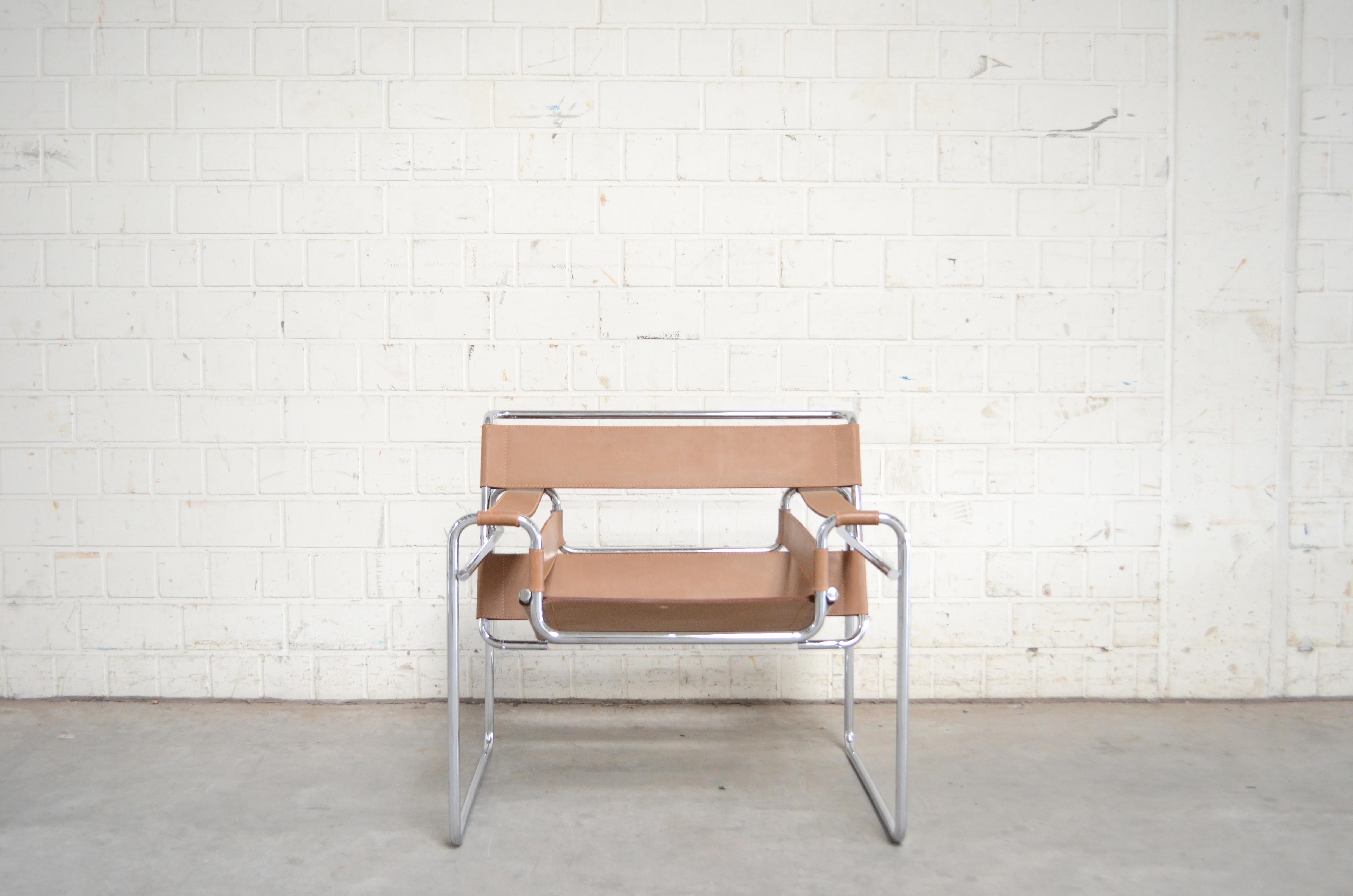 This Wassily chair, in chromed tubular steel and caramel leather, was designed by Marcel Breuer and produced by Gavina.
It's an early edition before 68 with the stamp underneath the seat.
 