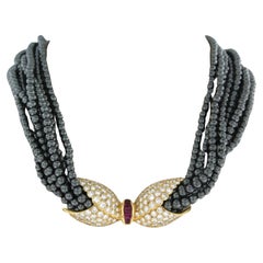 Gay Freres -18k yellow gold with ruby, diamonds and hematite