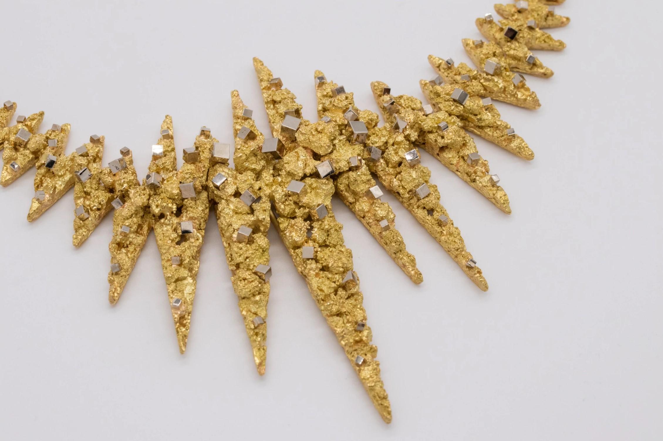 Impressive Stardust necklace designed by Gay Freres.

A rare and one-of-a-kind sculptural vintage piece, created in Switzerland during the post war period, circa 1950. This unusual necklace has been conceived as an stardust explosion with spikes by