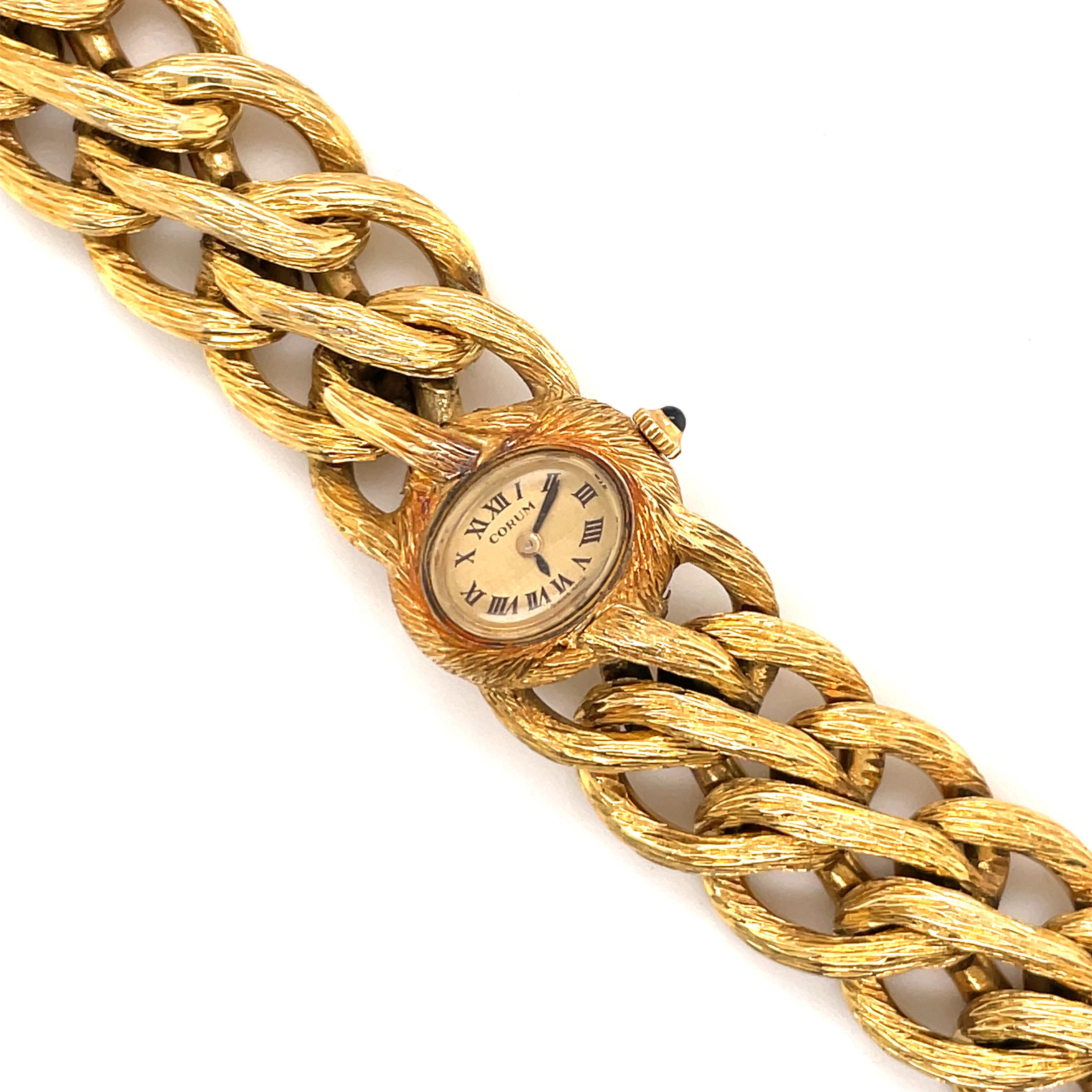 18 Karat Yellow Gold wristwatch featuring an oval shape dial by Corum with a 12 hour dial on a Gay Frères signature braided bracelet. 
Case: 19mm
Movement: Mechanical, Hand-Winding
Working Condition

Gay Frères was founded by Jean-Pierre Gay and