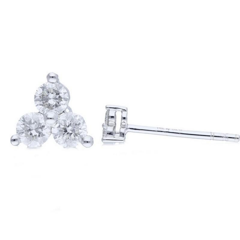 Peso in carati dei diamanti: Questi squisiti orecchini presentano un totale di 0.16 carati di diamanti. Ogni orecchino è impreziosito da sei diamanti a taglio rotondo, accuratamente selezionati per la loro brillantezza e qualità.

Composizione