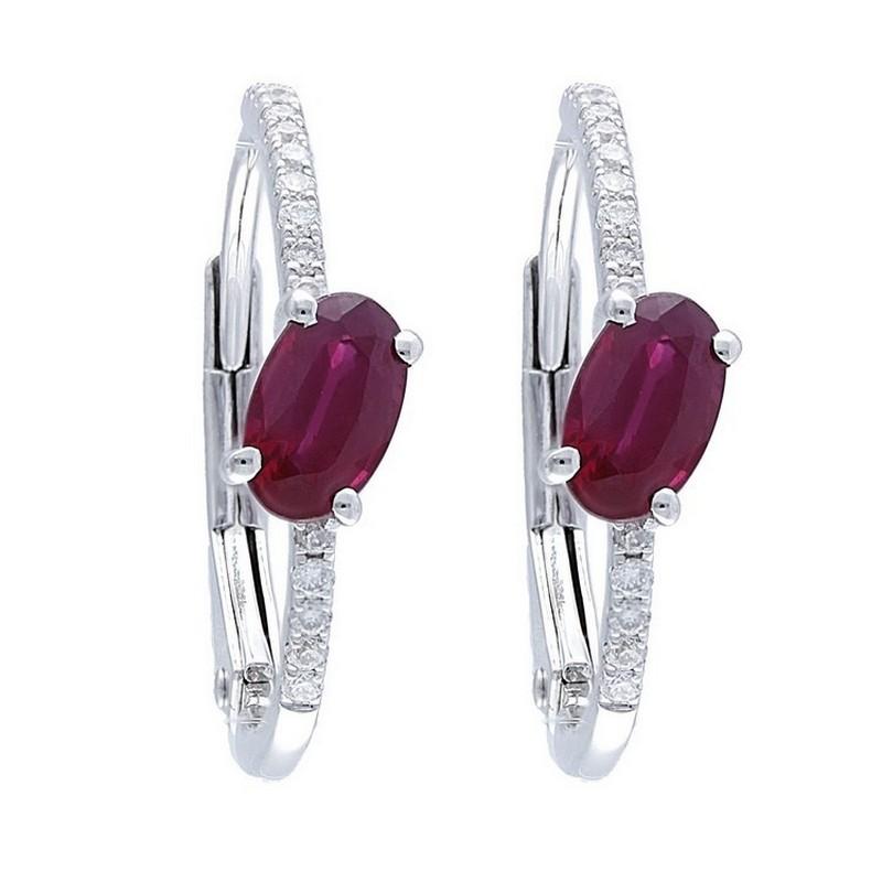 Diamond and Ruby Carat Weight: These exquisite Gazebo Fancy Collection earrings feature a captivating combination of gemstones. They are adorned with 0.12 carats of dazzling diamonds and 0.52 carats of vibrant oval-cut rubies, creating a unique and