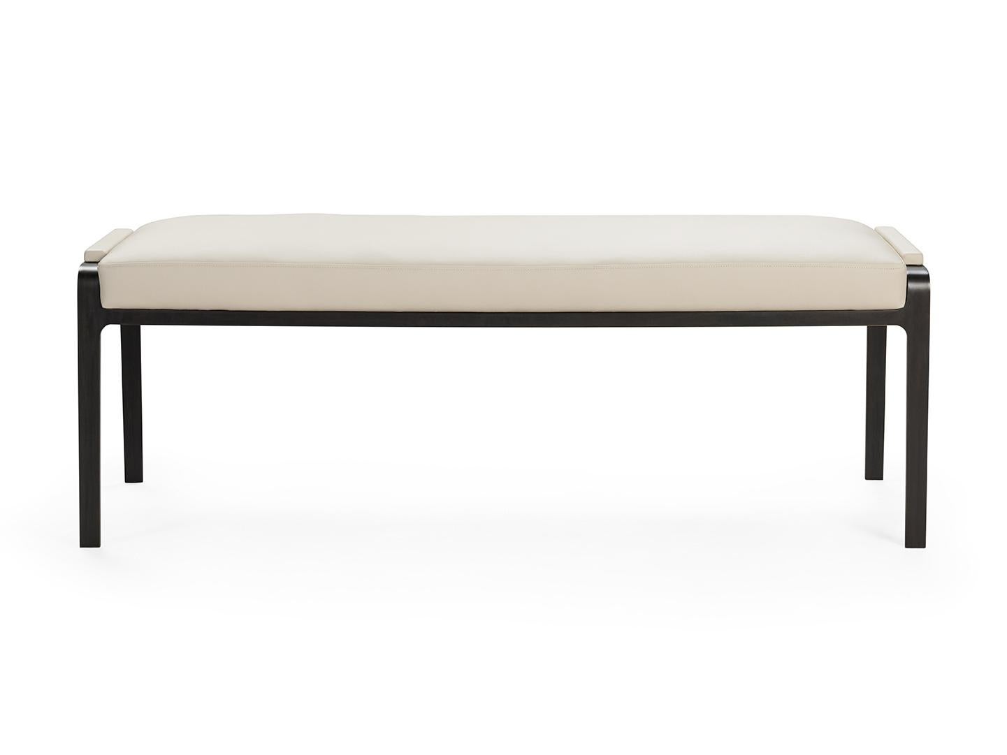 Gazelle bench is both minimal and luxurious. A delicate metal framework raises the seat and wraps the back emphasizing the chairs dynamic stance. This timeless design with its energetic proportions echoes its graceful namesake animal. Appearing