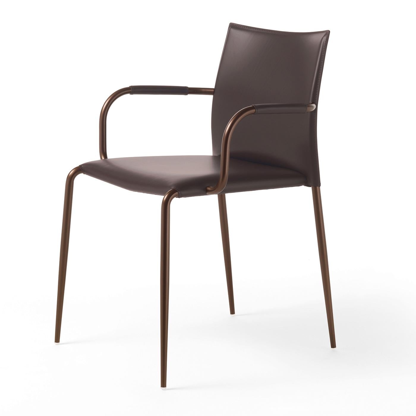 This armchair is characterized by minimalist, simple lines synonymous with great elegance. It's stackable and suitable for all contexts, from residential to hospitality. Its metal, tubular structure is painted bronze, while its seat, arms and back