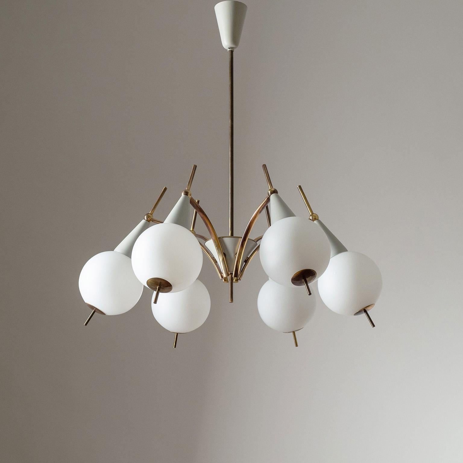 Fine Italian six-arm chandelier by G.C.M.E., from the 1950-1960s. Polished brass structure with grey lackered elements and blown satin glass globes with brass finials. Very nice original condition with some patina on the brass and barely any wear to