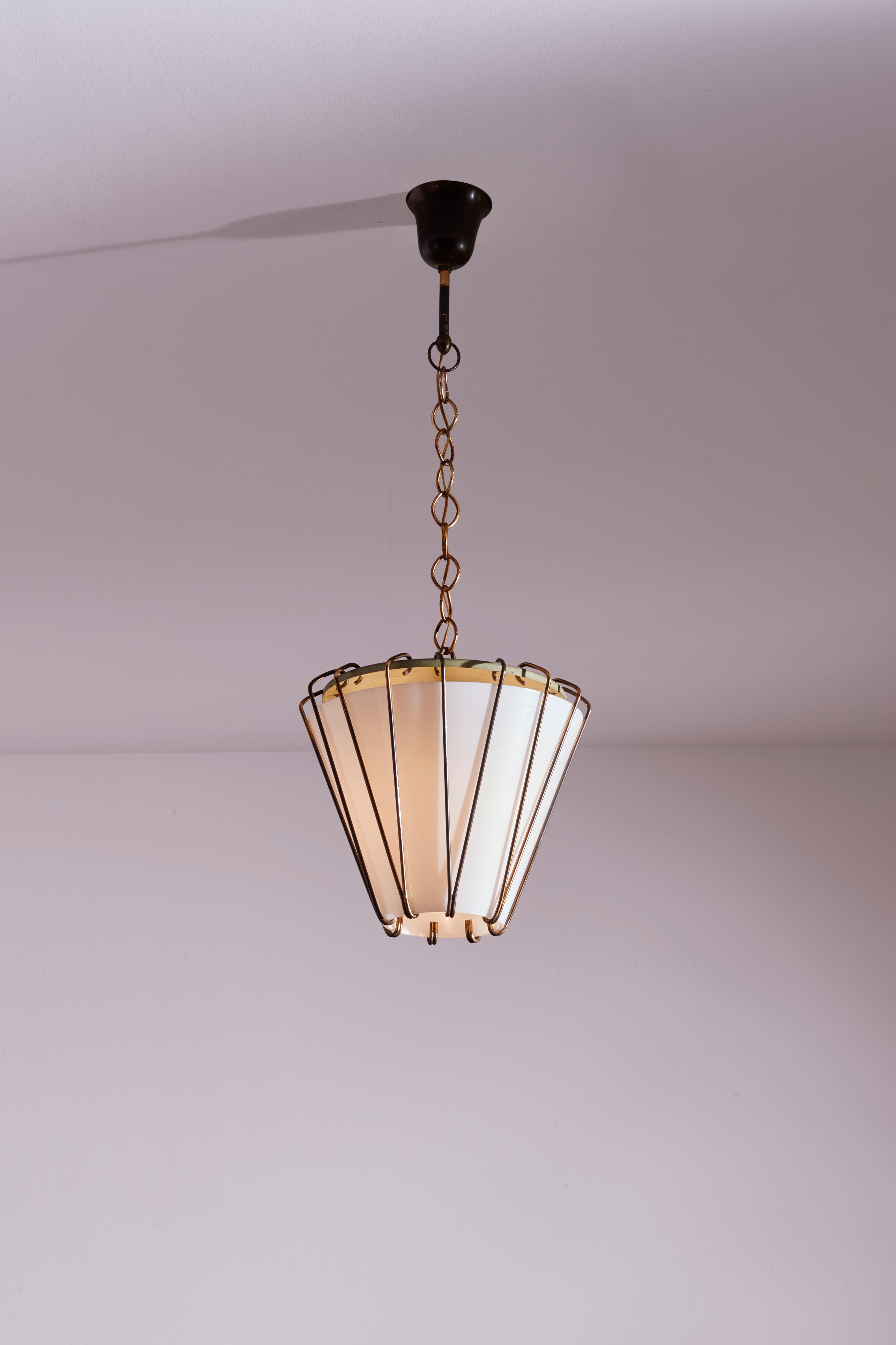 Brass Suspension Lamp with Opaline Glass and Painted Metal, 1950s, Manufactured by GCME

A charming lantern featuring a glass cone supported by a brass structure. Thin hooks, in their simplicity, enhance the delicate opaline lampshade, making it