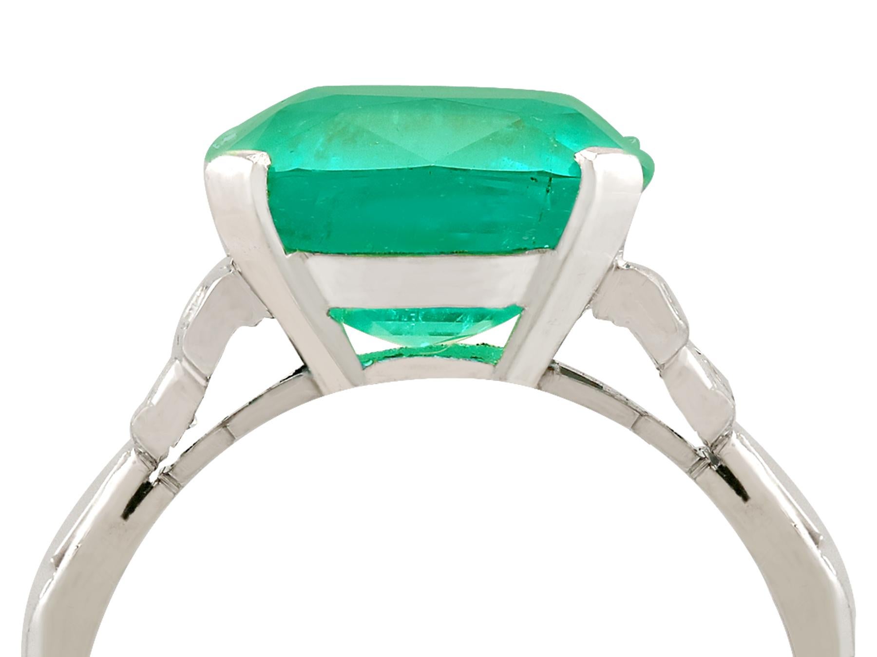 A stunning antique 5.00 carat Colombian emerald, 0.46 carat diamond and platinum cocktail ring; part of our diverse antique jewelry and estate jewelry collections.

This stunning, fine and impressive Colombian emerald and diamond ring has been