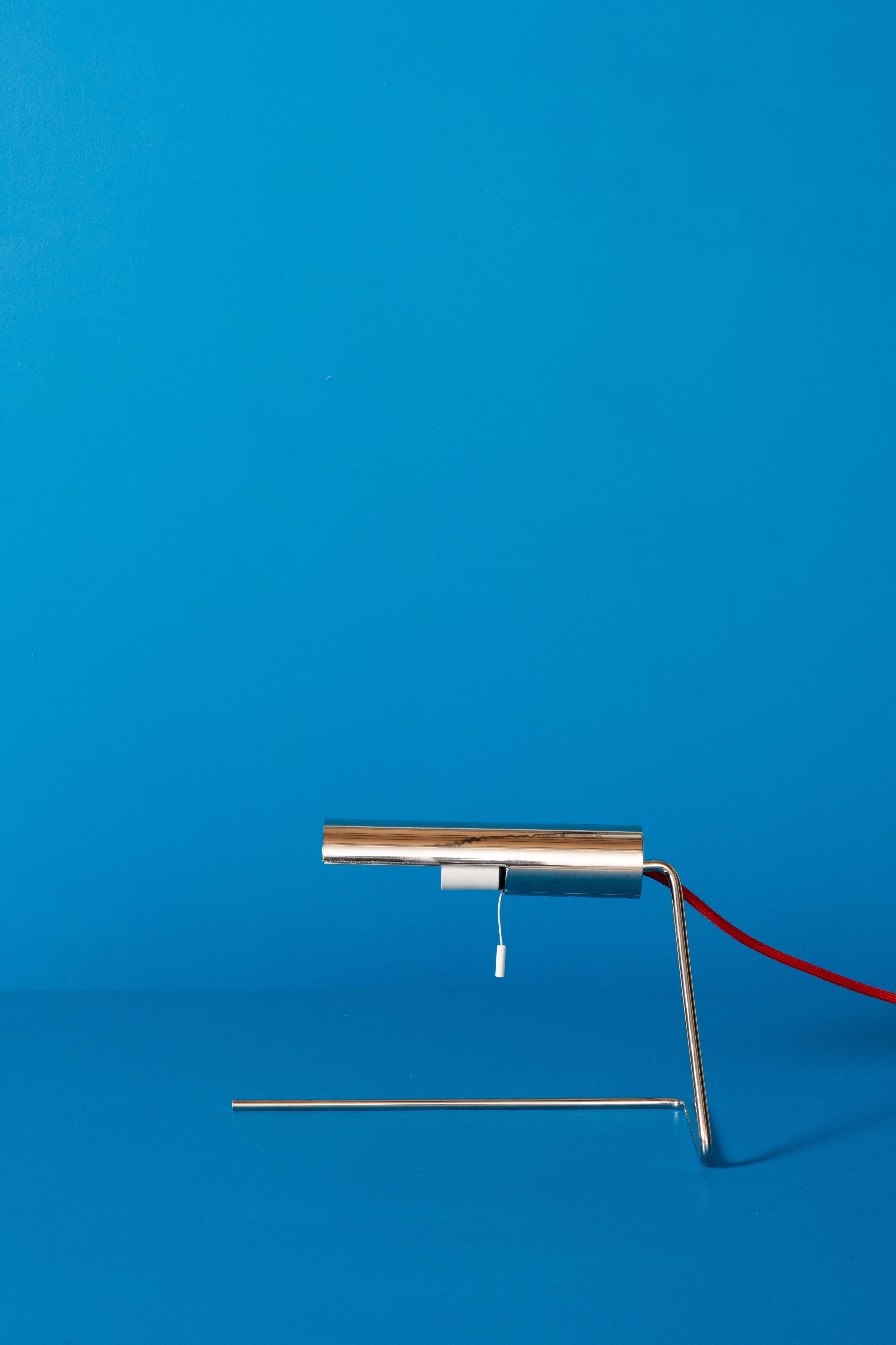 This rare table lamp GE 106 was designed by Christophe Gevers and manufactured in the 70's by Light.
Christophe Gevers was a famous Belgian interior architect. He worked on quite a number of private homes in Belgium and France, some restaurants,