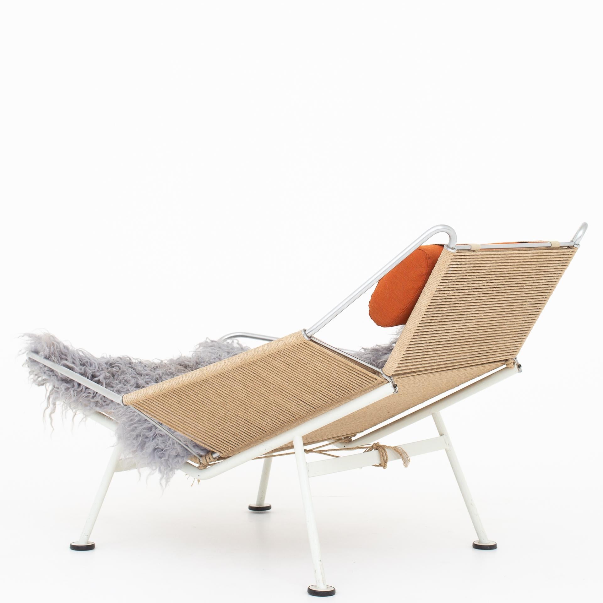 GE 225, flag halyard chair with white lacquered frame and original braid. New wool hide and neck cushion in orange Remix. Maker GETAMA.