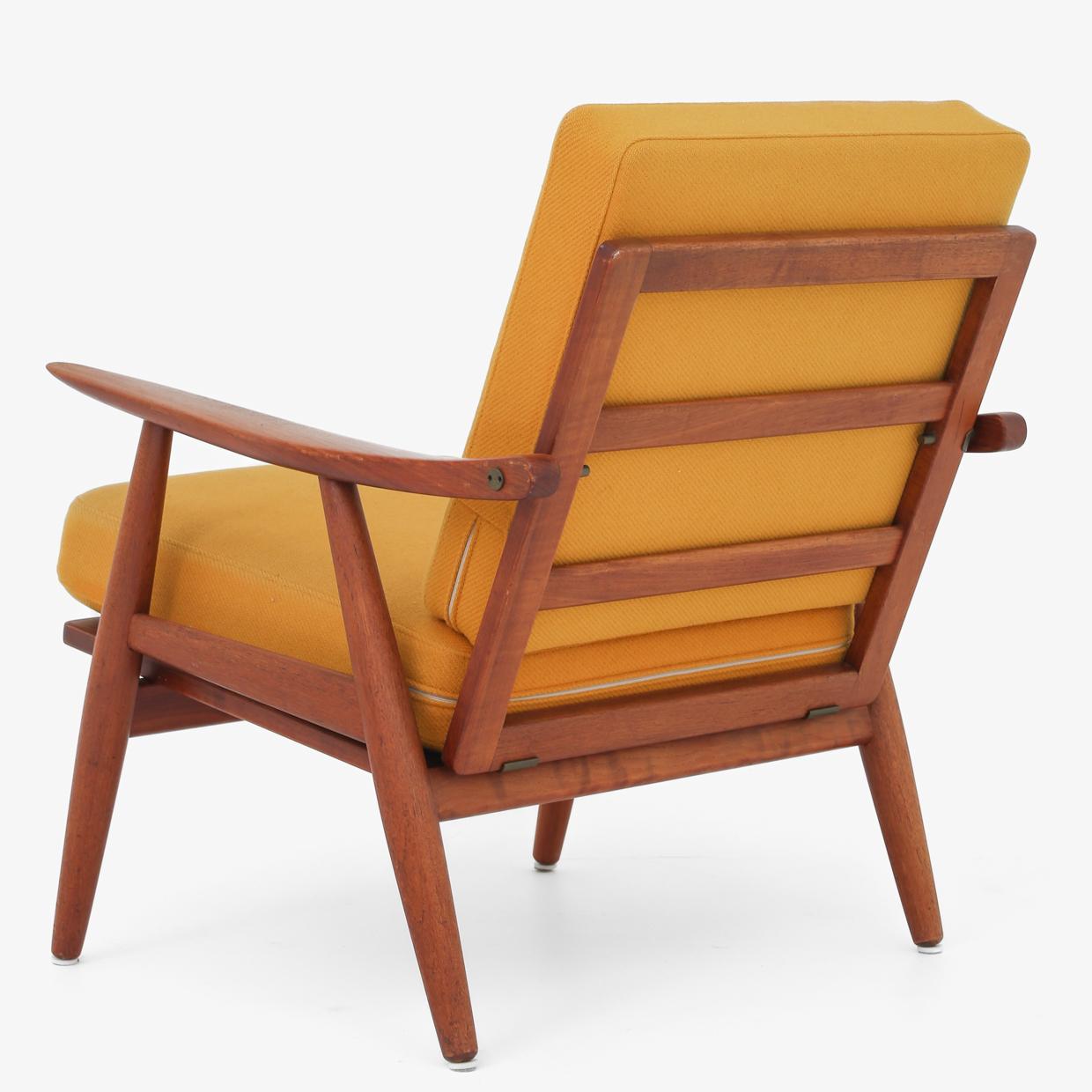 GE 270 - Easy chair in teak with cushions in yellow wool. Hans J. Wegner / GETAMA.