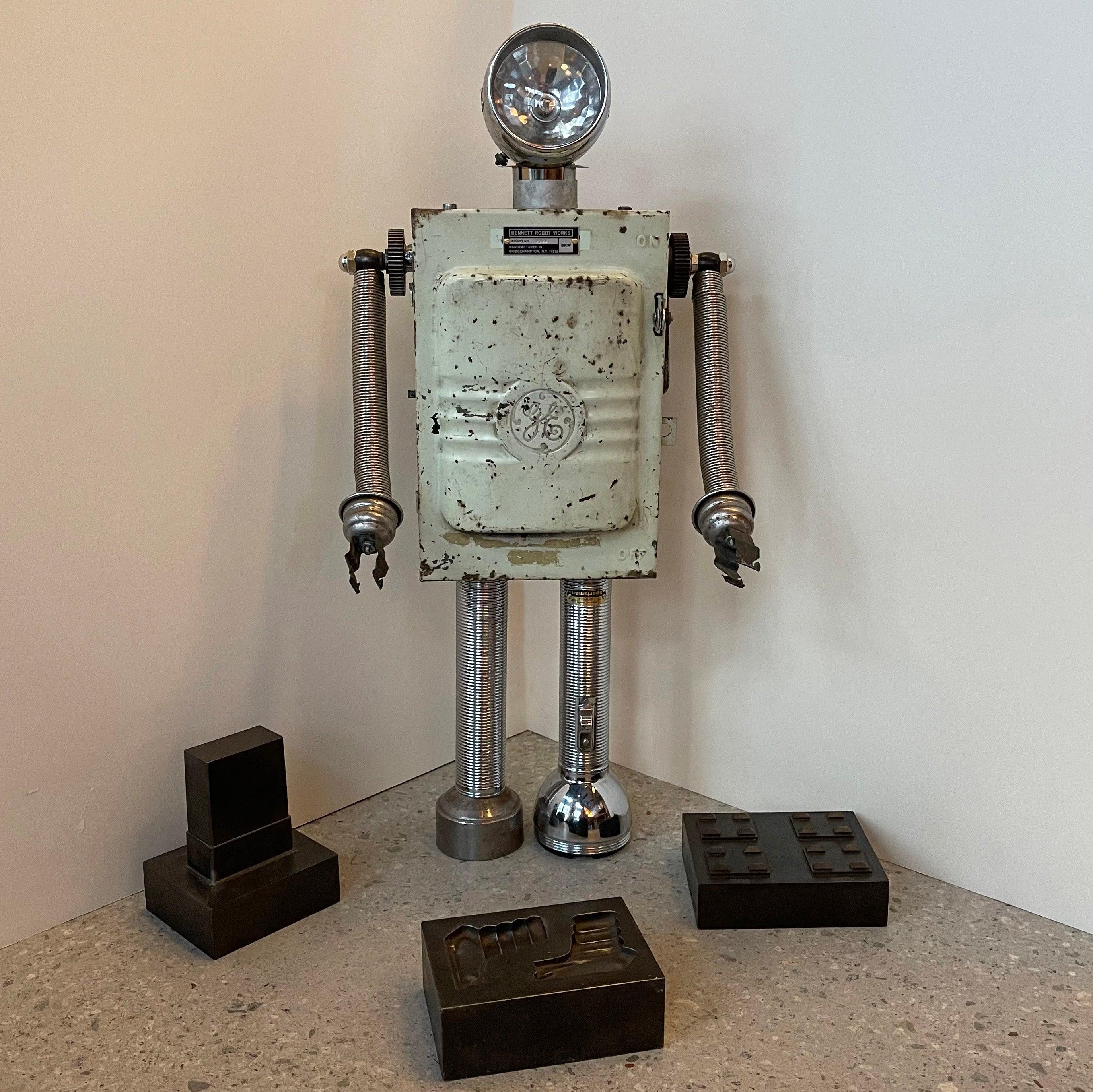 Custom robot sculpture named G.E. by Bennett Robot Works, Brooklyn, NY

Bennett Robot Works, robot sculptures created by Gordon Bennett, are composed of found, vintage objects used in their unaltered entirety. They are inspired by Norman Bel