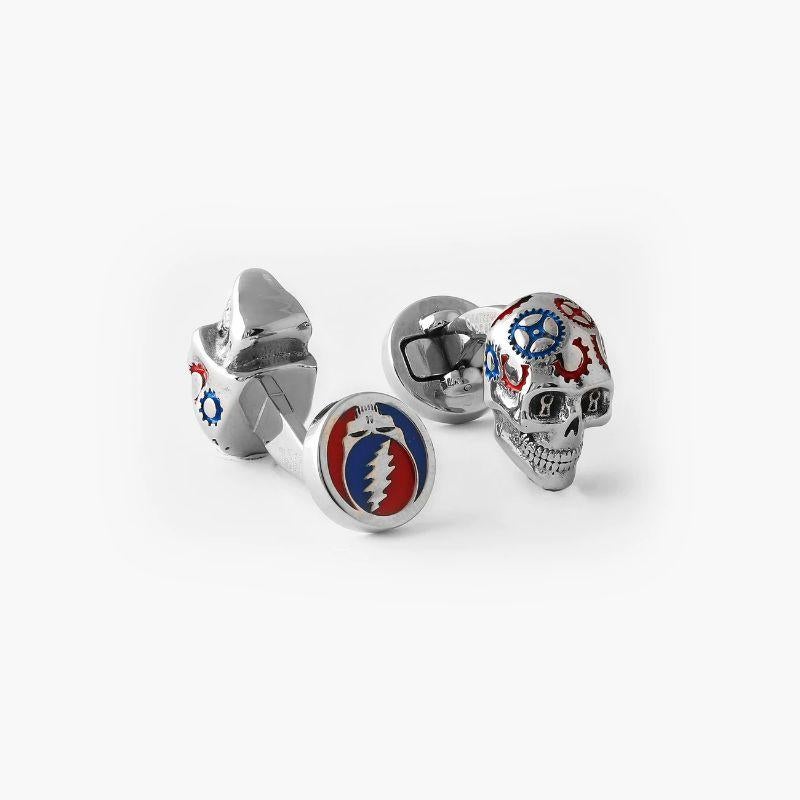 Gear Skull cufflinks in IP plated stainless steel

The painted skull is a Tateossian take on the Grateful Deadâ€™s Iconic skull, featuring classic Tateossian gears with a psychedelic twist. The cufflinks feature artwork from their album â€˜Steel