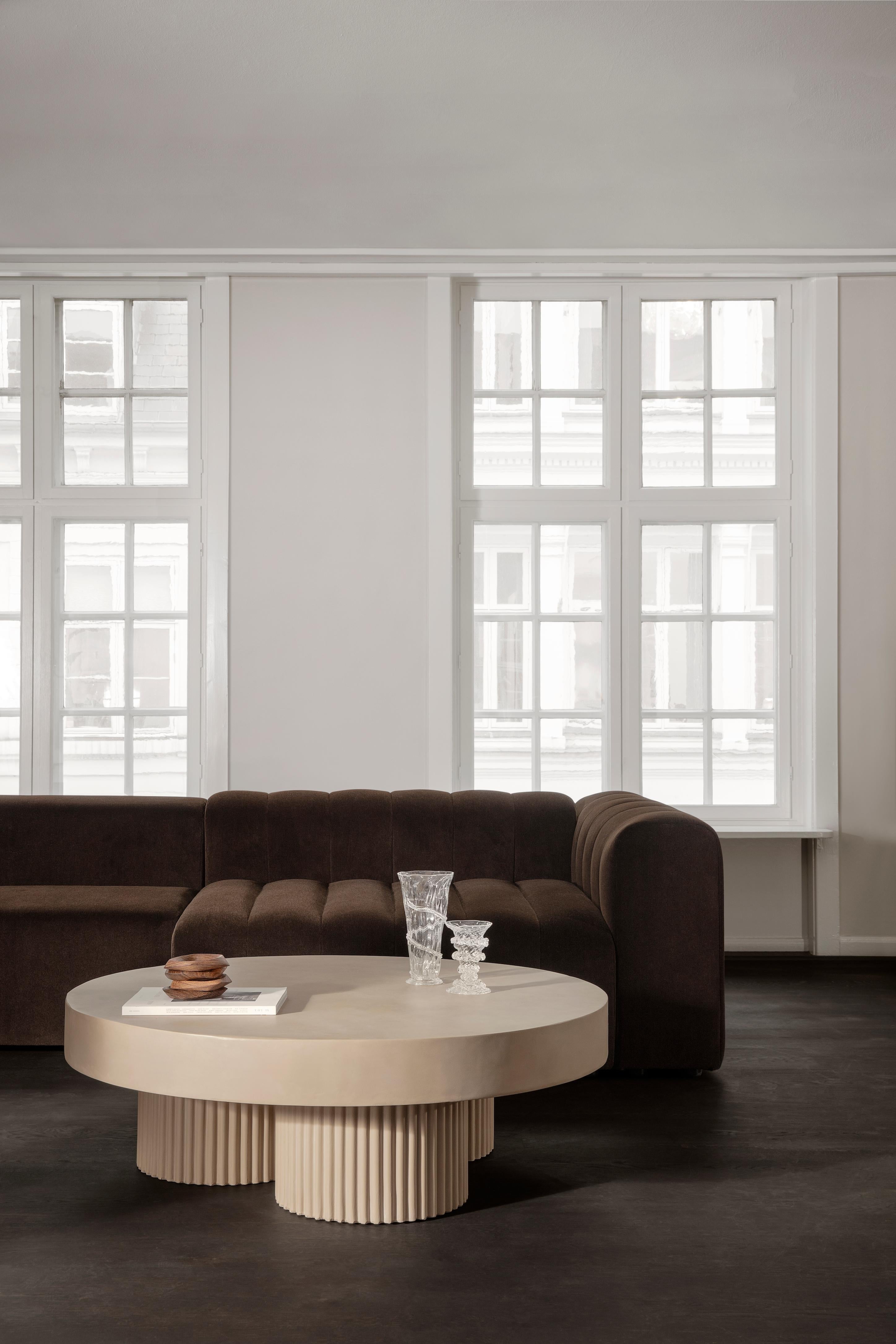 Gear Tables
by Kristian Sofus Hansen & Tommy Hyldahl

Gear is a collection of sculptural coffee tables, inspired by Ancient Greek columns. Gear is designed as a simplified block-like structure with three riffled legs, adding a refined detail to the