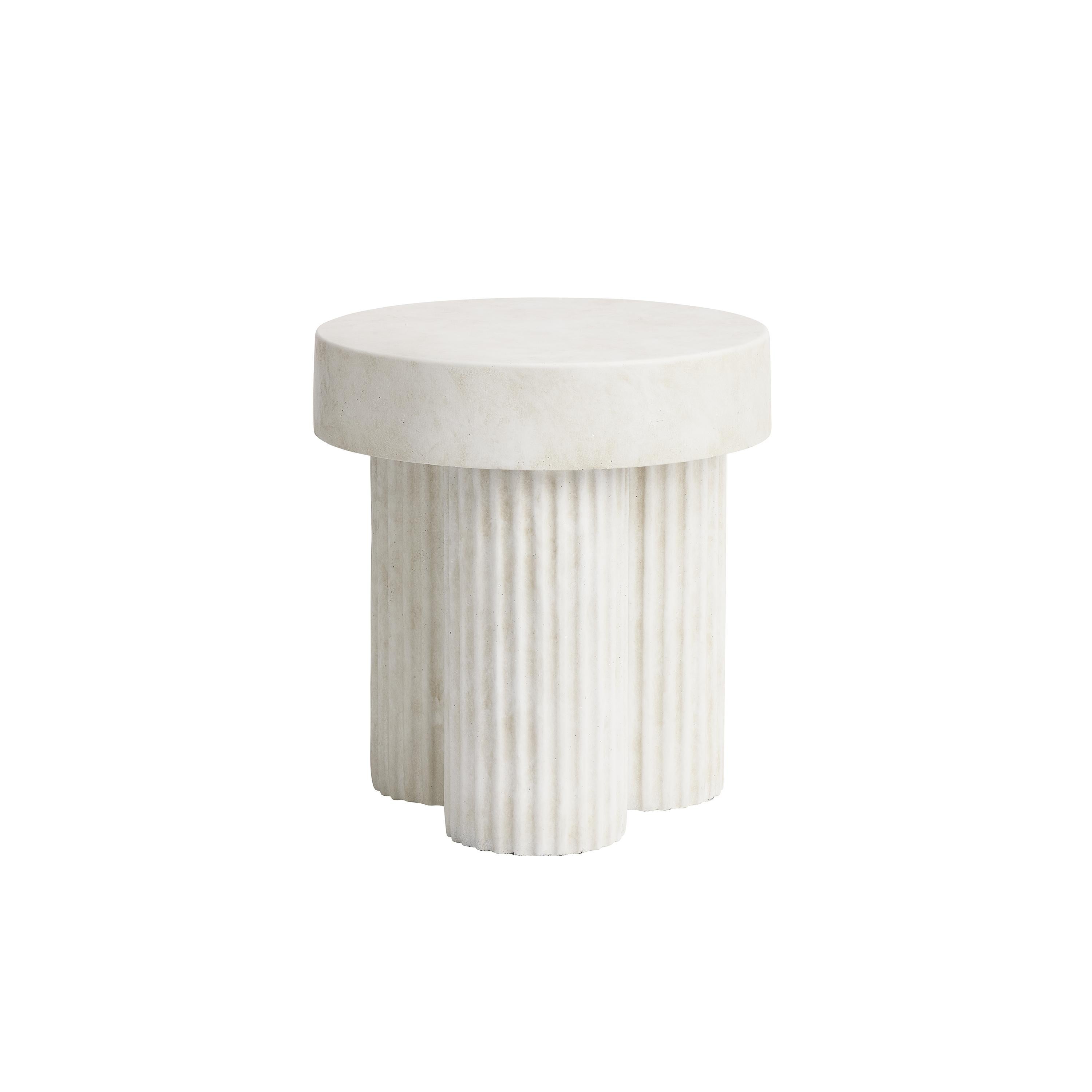 Gear tables
by Kristian Sofus Hansen & Tommy Hyldahl

Gear is a collection of sculptural coffee tables, inspired by Ancient Greek columns. Gear is designed as a simplified block-like structure with three riffled legs, adding a refined detail to