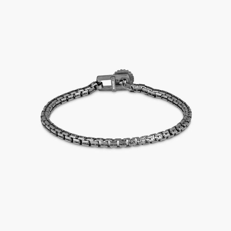 Gear Venetian Chain Bracelet in Oxidised Sterling Silver, Size S

The Venetian style, cut out box chain in 3.7mm thickness, is finished with our signature gear clasp, using black rhodium plated sterling silver for a masculine finish. To open, lift