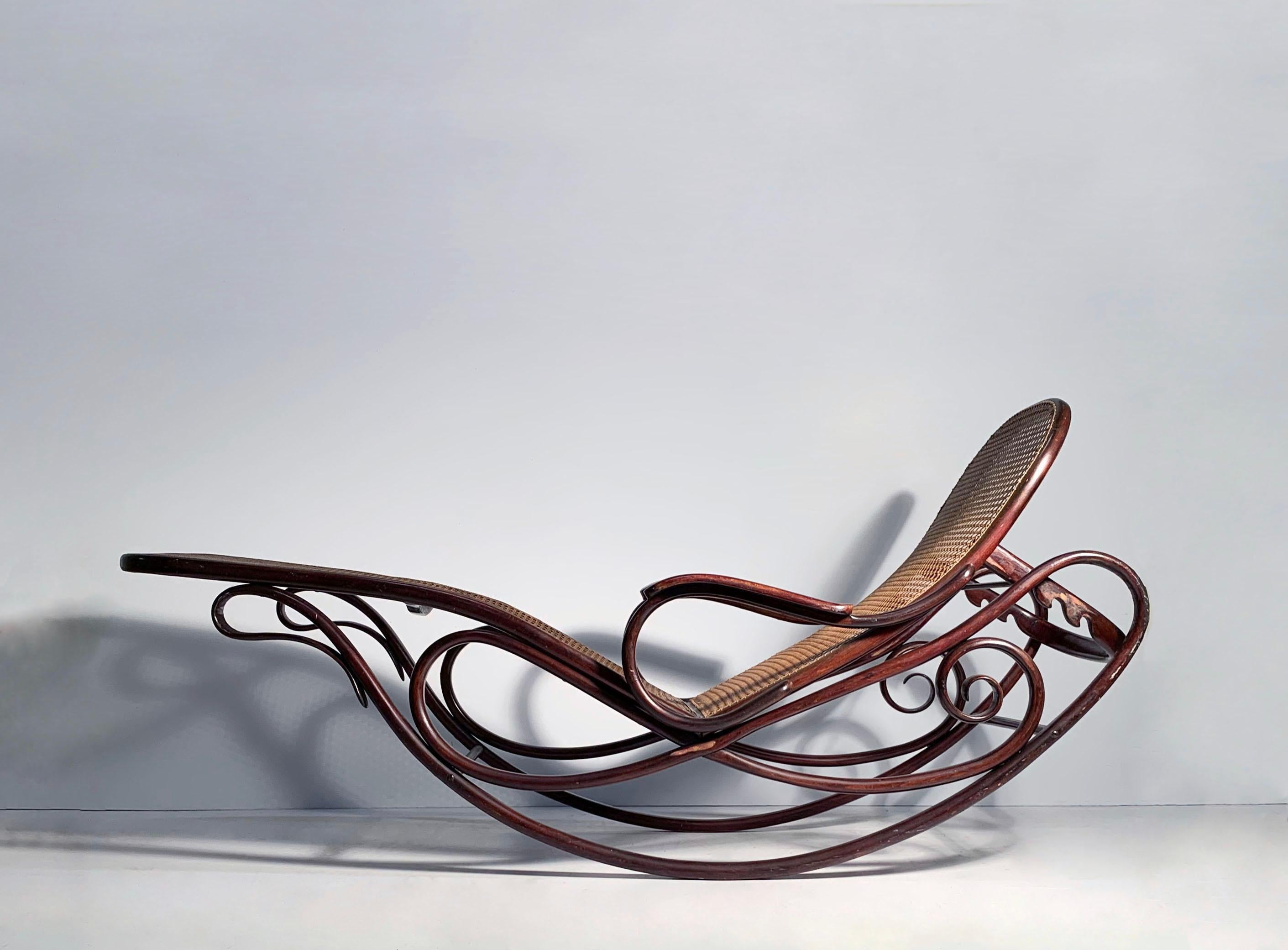 Gebruder Thonet bentwood rocking chaise lounge chair
Scarcely seen model no. 7500. Designed 1880-1883. 

This model appears to be stamped JJ Kohn on underside.
Thonet Merged with Mundus-Kohn in 1922. Difficult to date the exact production time