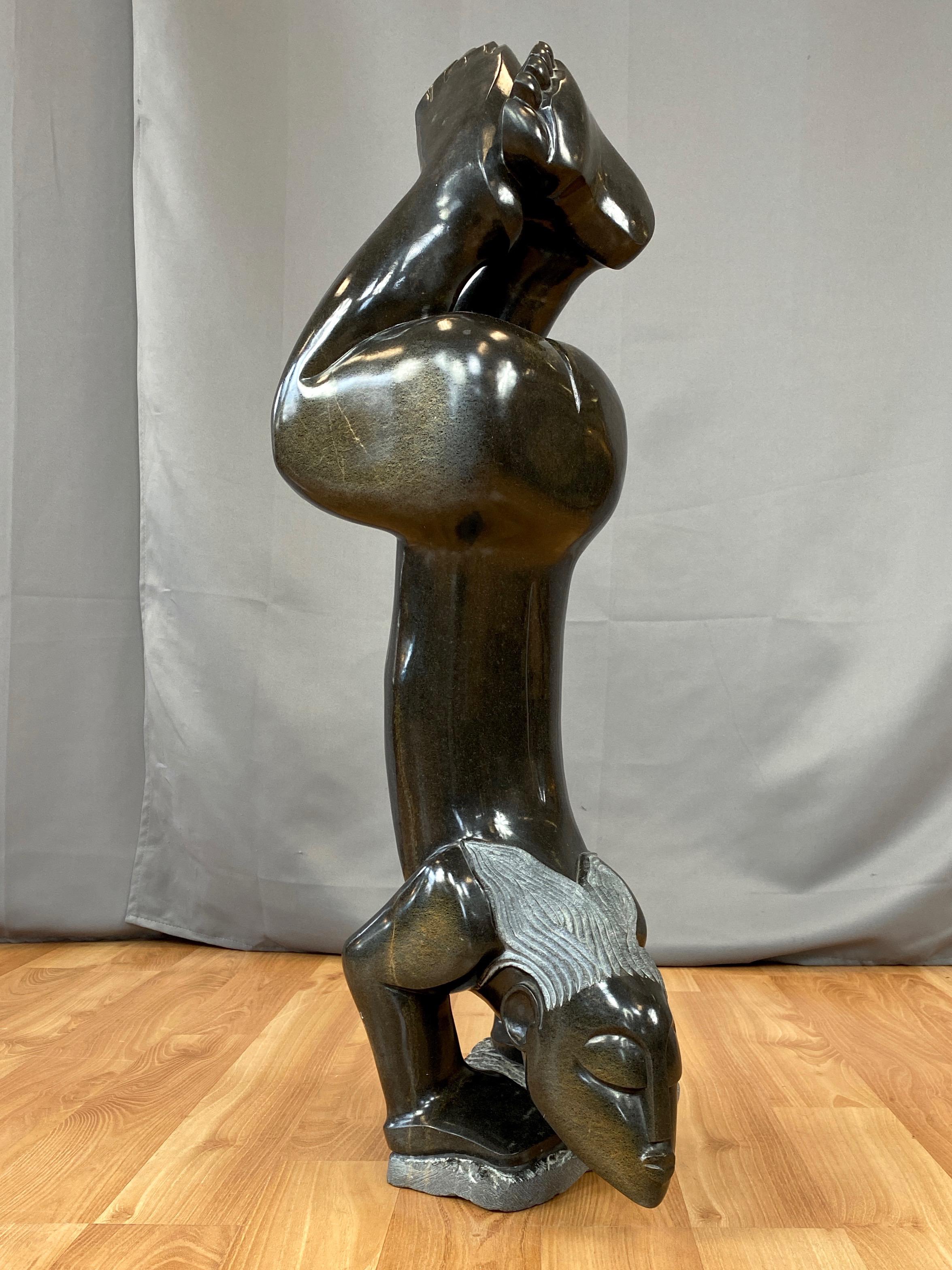 Late 20th Century Gedion Nyanhongo “Exercising”, Large Shona Springstone Sculpture, 1990s For Sale