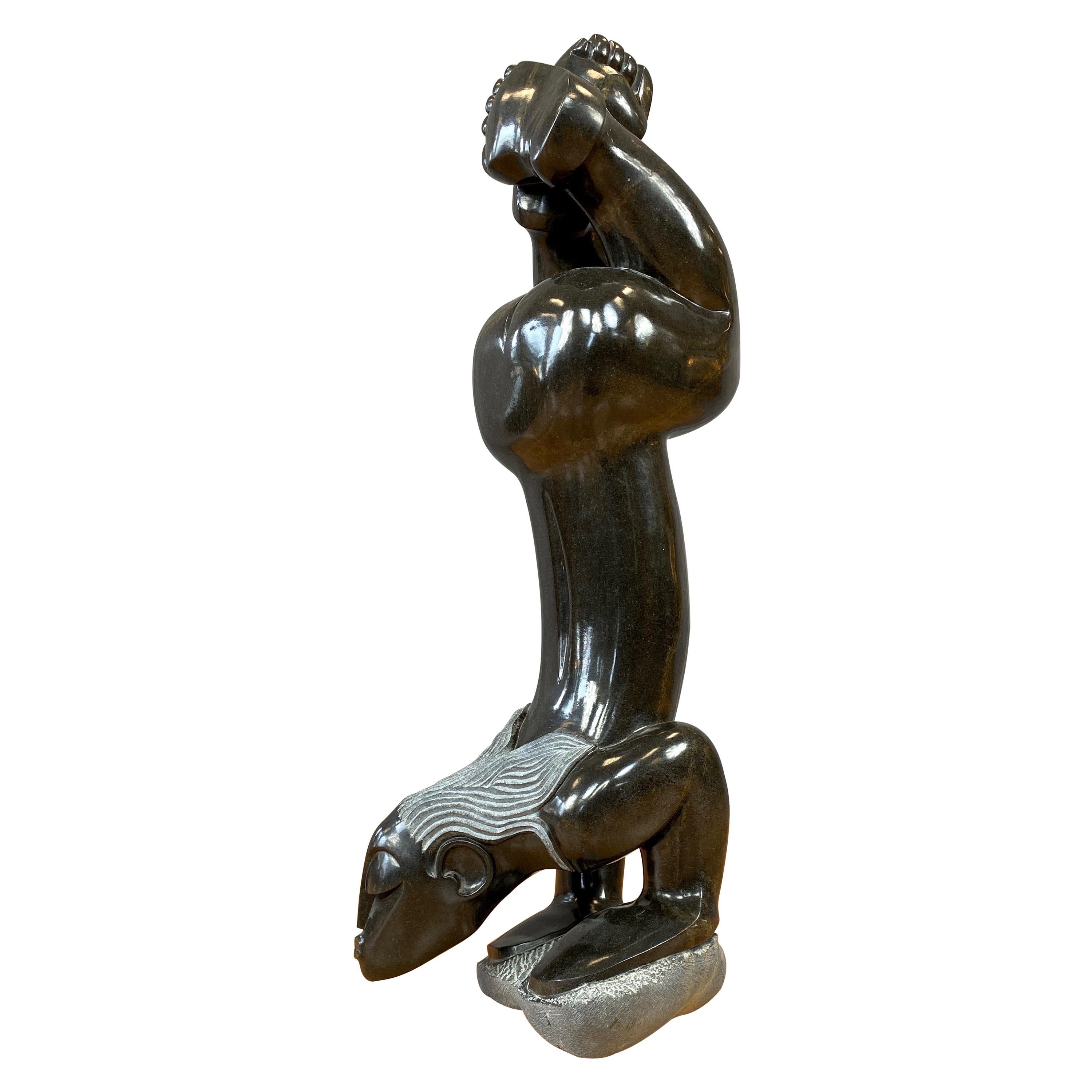Gedion Nyanhongo “Exercising”, Large Shona Springstone Sculpture, 1990s For Sale