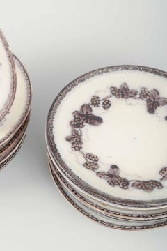 Gefle. Set of 12 round faience plates with grapevine motif. “Mullbär” pattern.