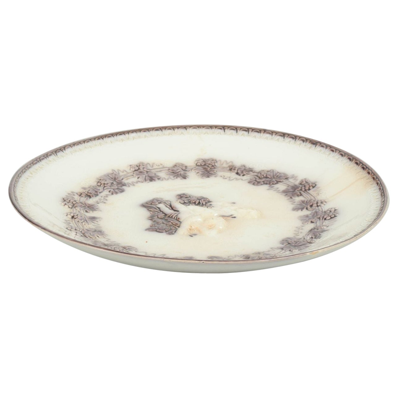 Gefle, Sweden. Round faience plate with putti figures, c. 1880/90s For Sale