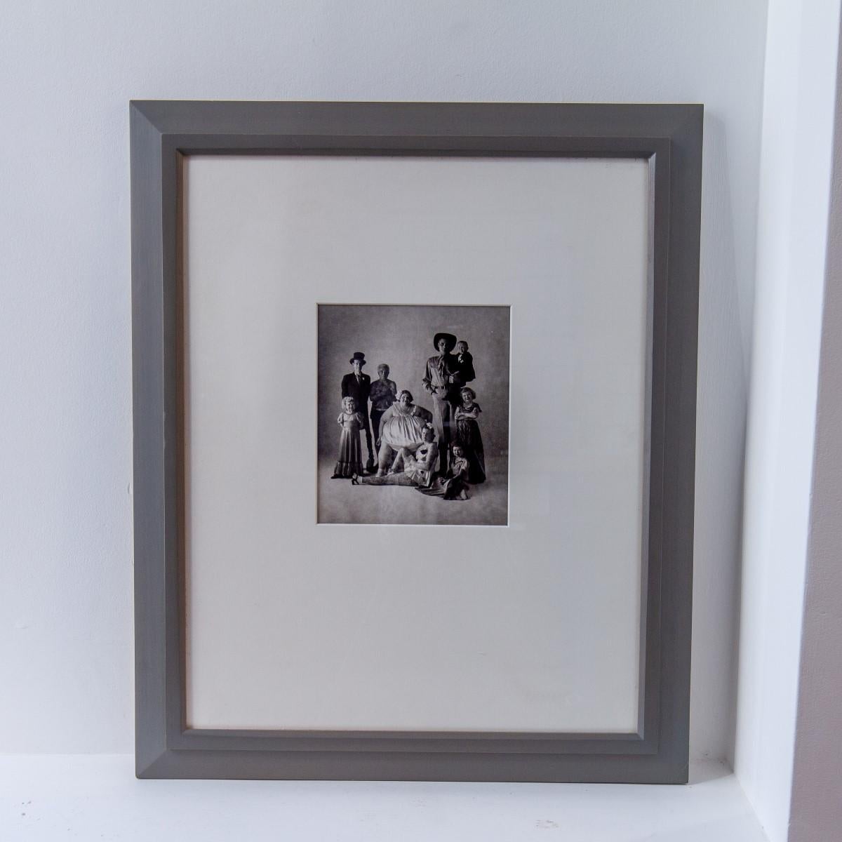 A framed black and white photograph made of gelatin silver titled 'Circus People' by Irving Penn, 1947. Stickered to the rear by art galleries, Keith de Lellis and Andre Emmerich, both in New York. 

Irving Penn (1917-2009) was one of the 20th