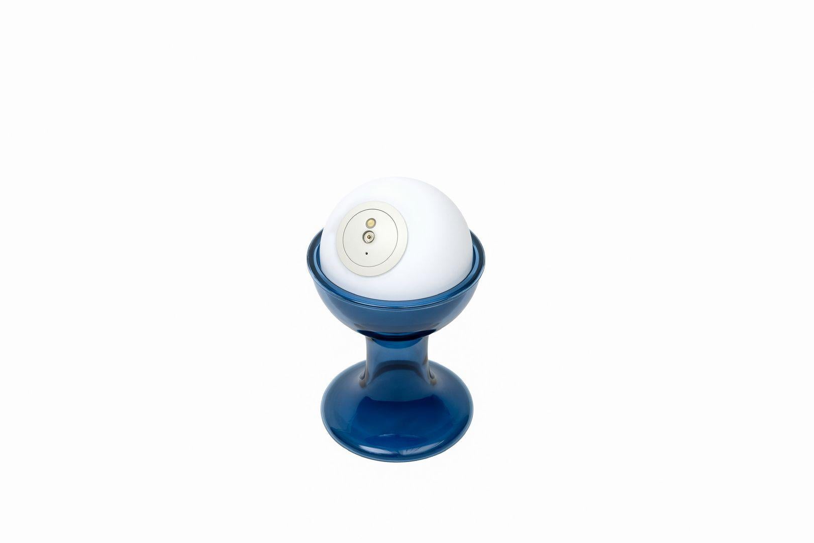 Gelato
Originally designed in the 1960s by Murano-based Carlo Nason, Gelato has been re-engineered into a playful portable lamp. Its colourful mouth-blown base holds an orb of acid-etched opaline glass. The sphere is lit by a replaceable custom-made
