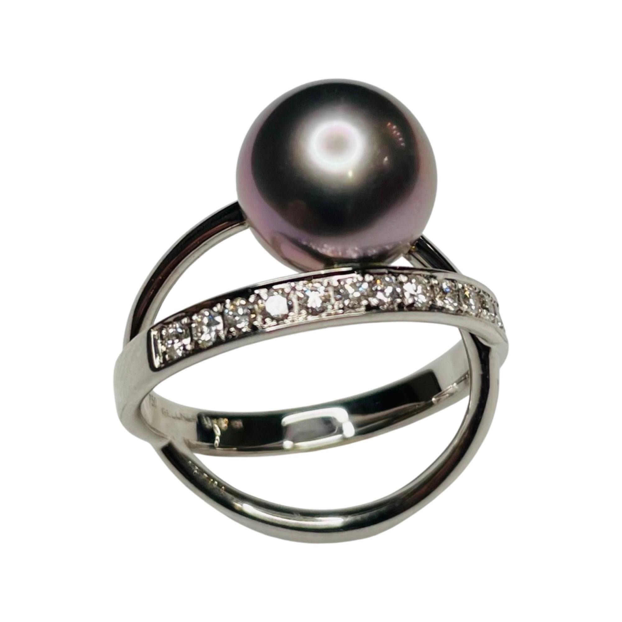 Gellner 18K White Gold Tahitian Black Pearl and Diamond Ring. The black, natural color, cultured Tahitian pearl is 11.00 mm. The pearl is a whole pearl with slight spotting and high luster. It has a rose poe rava overtone. There are 16 full cut
