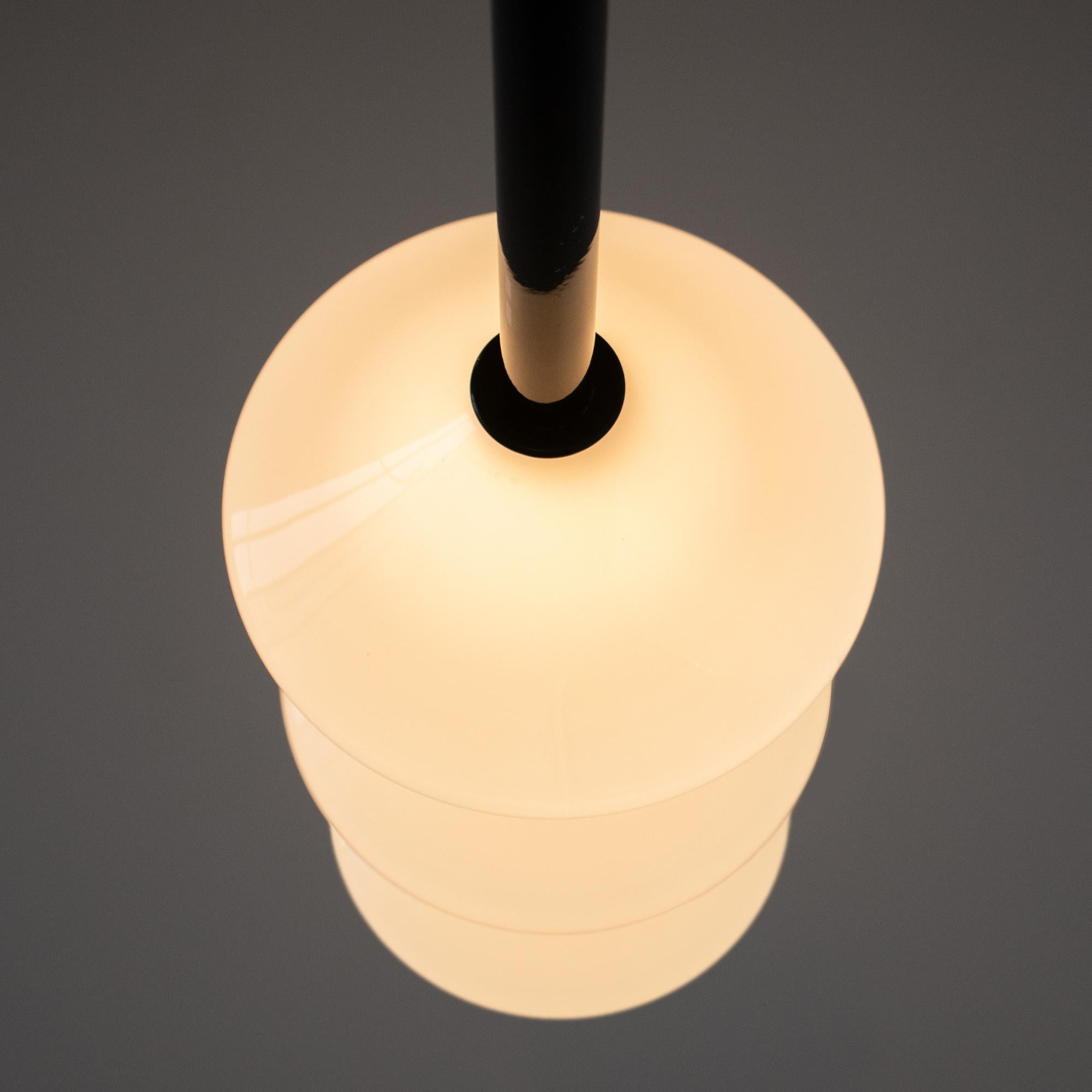 The GEM 3 Linear Pendant is built of brass with an LED light source that is diffused by a hand-blown opal white glass diffuser. This pendant works as an individual fixture or can be installed in larger groupings to create a dynamic installation. Use