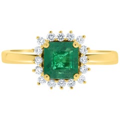 Gem Bleu 1.17 Carat Emerald Ring with 0.21 Carat Diamonds Set in 14K Yellow Gold