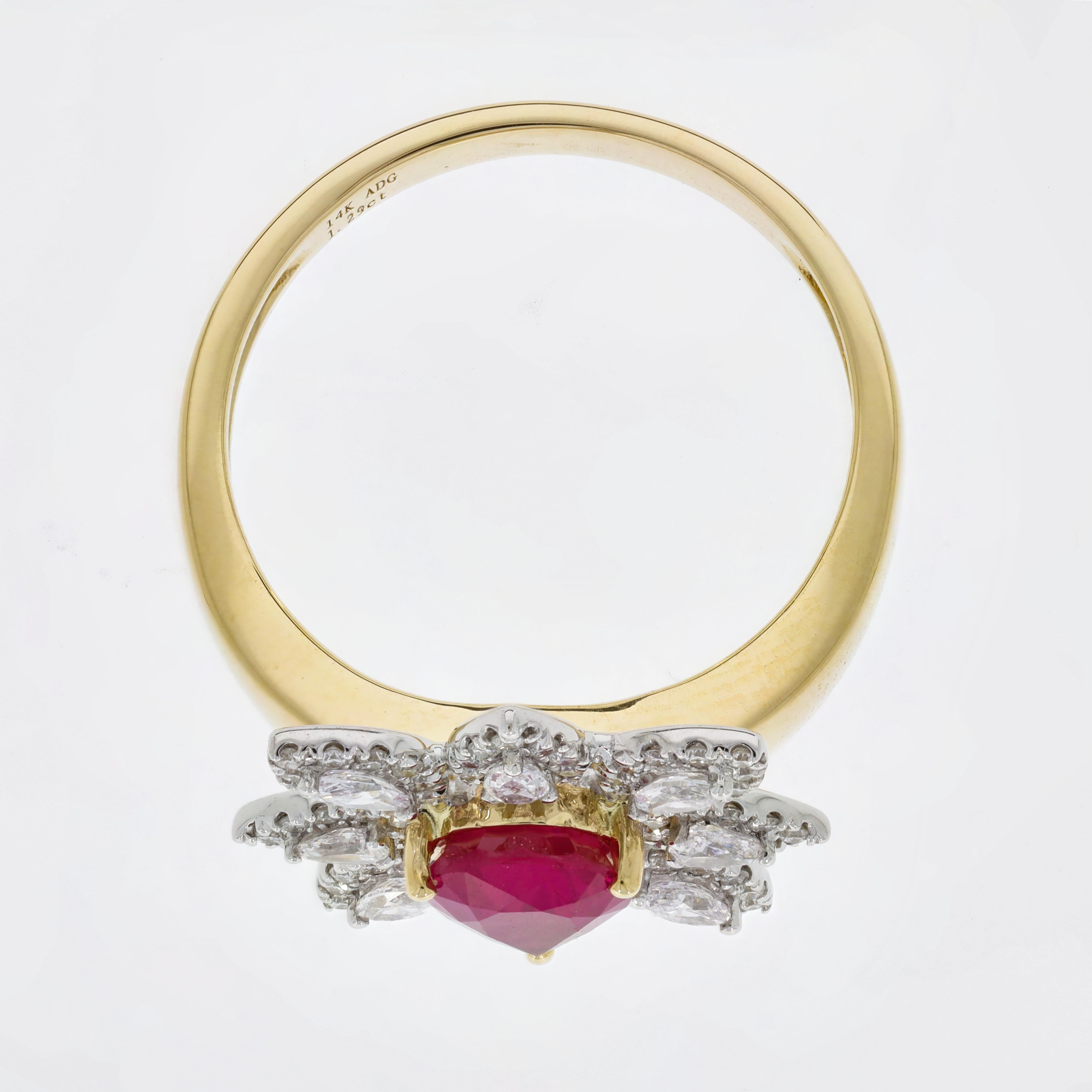 This stunningly vivid 1.29 carat unheated ruby is cut in an alluring pear shape and adorned with 0.58 carats of accent diamonds set in gorgeous two-toned white and yellow gold. This gorgeous and classy ring is perfect for a night out with your loved