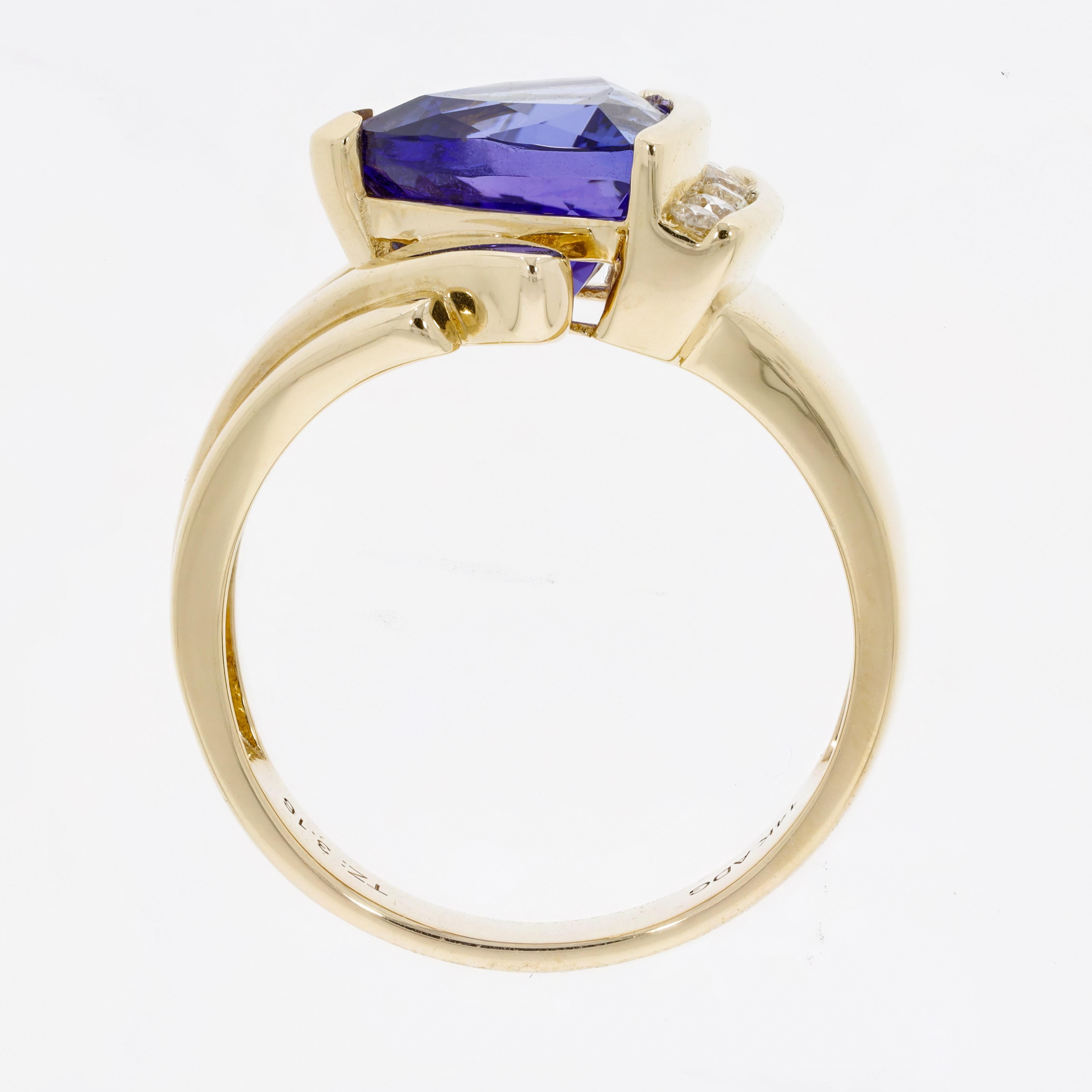 This Ring Is Regarded As A Timeless Masterpiece To Lend A Sparkling Look To Your Attire. Designed Of 14kt Yellow Gold, This Ring Has An Ultimate Design That Is Embellished With Trillion-cut Tanzanite And Round Diamonds Thus Adding Style To Its
