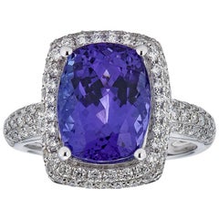 Gem Bleu Cushion Cut 5.26 Carat Tanzanite Ring with 0.87 Carat Diamond Halo Ring