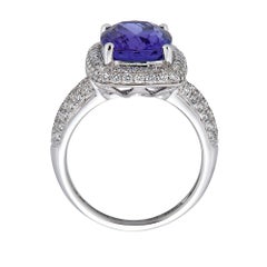 Gem Bleu Cushion Cut 5.26 Carat Tanzanite Ring with 0.87 Carat Diamond Halo Ring