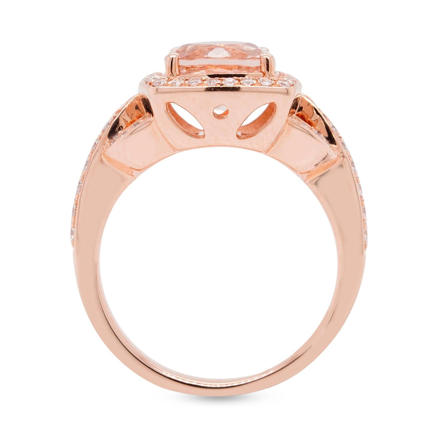 Introducing our stunning 2.07ct Morganite Cushion Shape Ring, the perfect blend of elegance and sophistication. This beautiful ring features a cushion-shaped morganite gemstone that's the centerpiece of the design, surrounded by a halo of sparkling