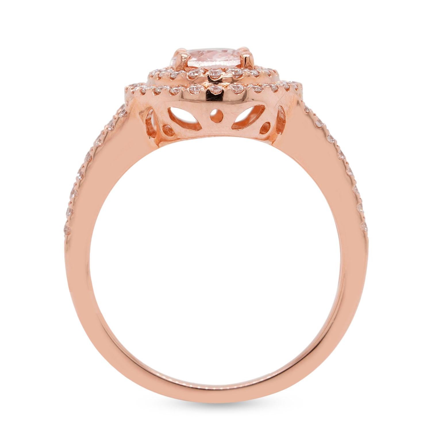 Introducing our stunning 0.93ct Morganite Double Halo Ring, the perfect balance of beauty and elegance. This ring is crafted with precision and care, featuring a beautiful oval-shaped morganite gemstone in the center, surrounded by not just one, but