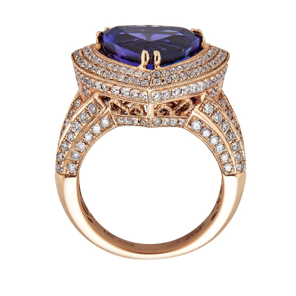 Upgrading your vogue for any occasion just got a whole lot easier with this spectacular ring. Created with a striking Tanzanite that spreads a marvelous hue, this captivating ring is designed in 14K rose gold that elevates its elegance. Accentuated