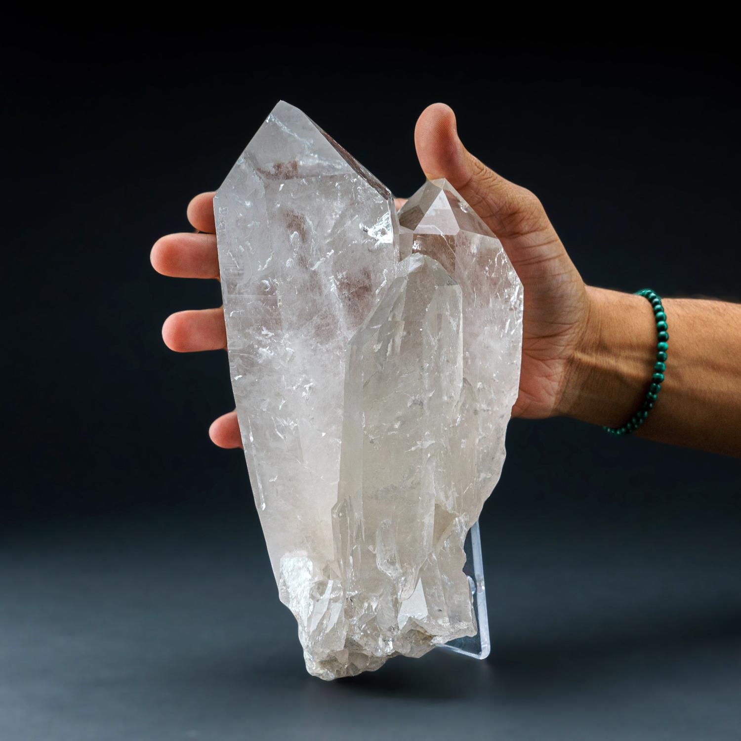 Top quality Brazilian Quartz point Crystal Cluster. This translucent crystal cluster has fully terminated quartz point crystals with lustrous highly reflective faces. 

Clear Quartz encourages clarity of thought and purpose to one’s heart and mind.