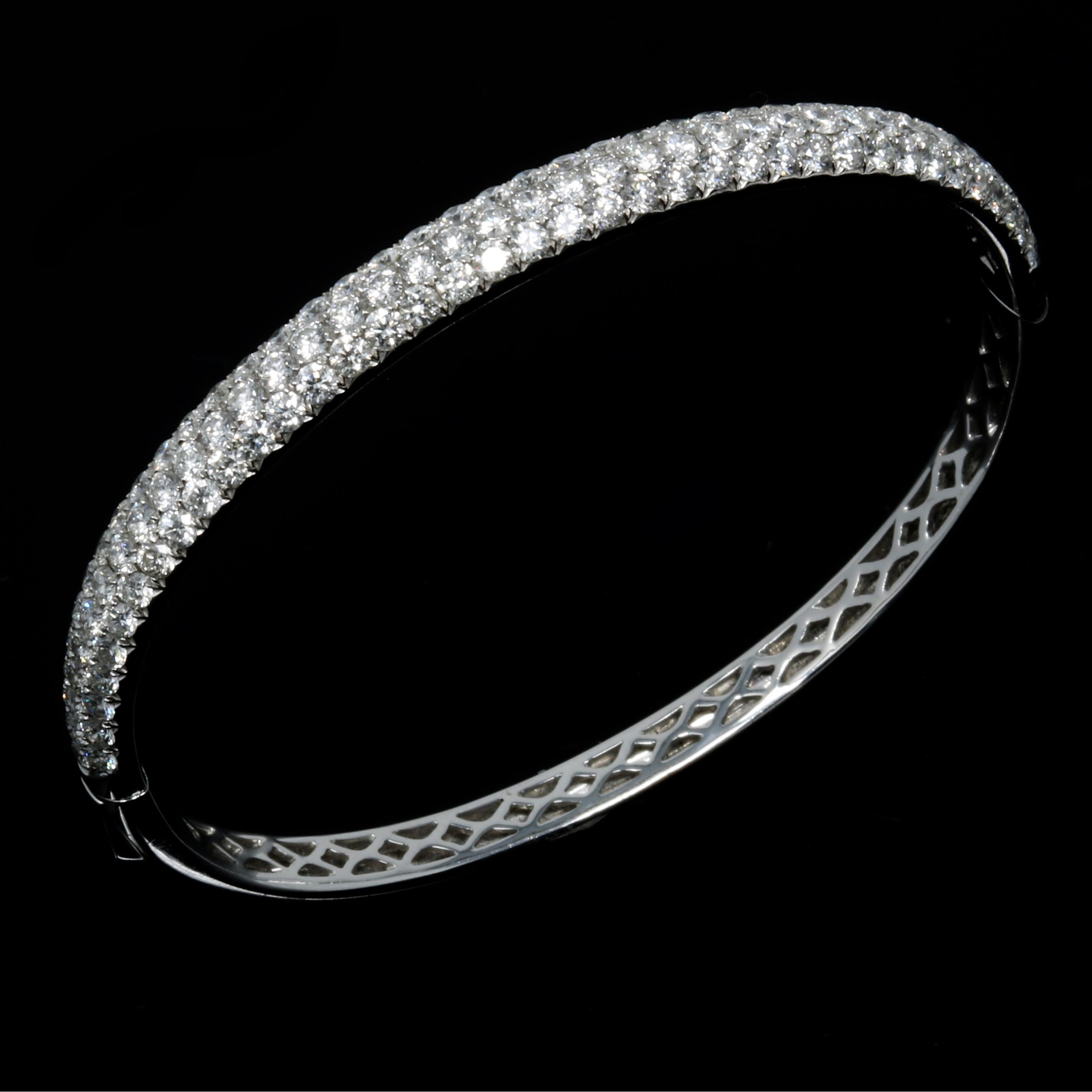 This Charming Bangle is stunning and unique.
18K White Gold with top Quality Diamonds. its beautifully finished, and very comfortable to wear. 
it can be worn everyday, or to any cocktail event.
Features:
115 Diamonds: 4.98 ct ttw
