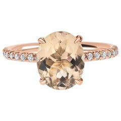 Used 2.10 Carat Oval Morganite and Diamonds Designer Ring in 14 Karat Rose Gold