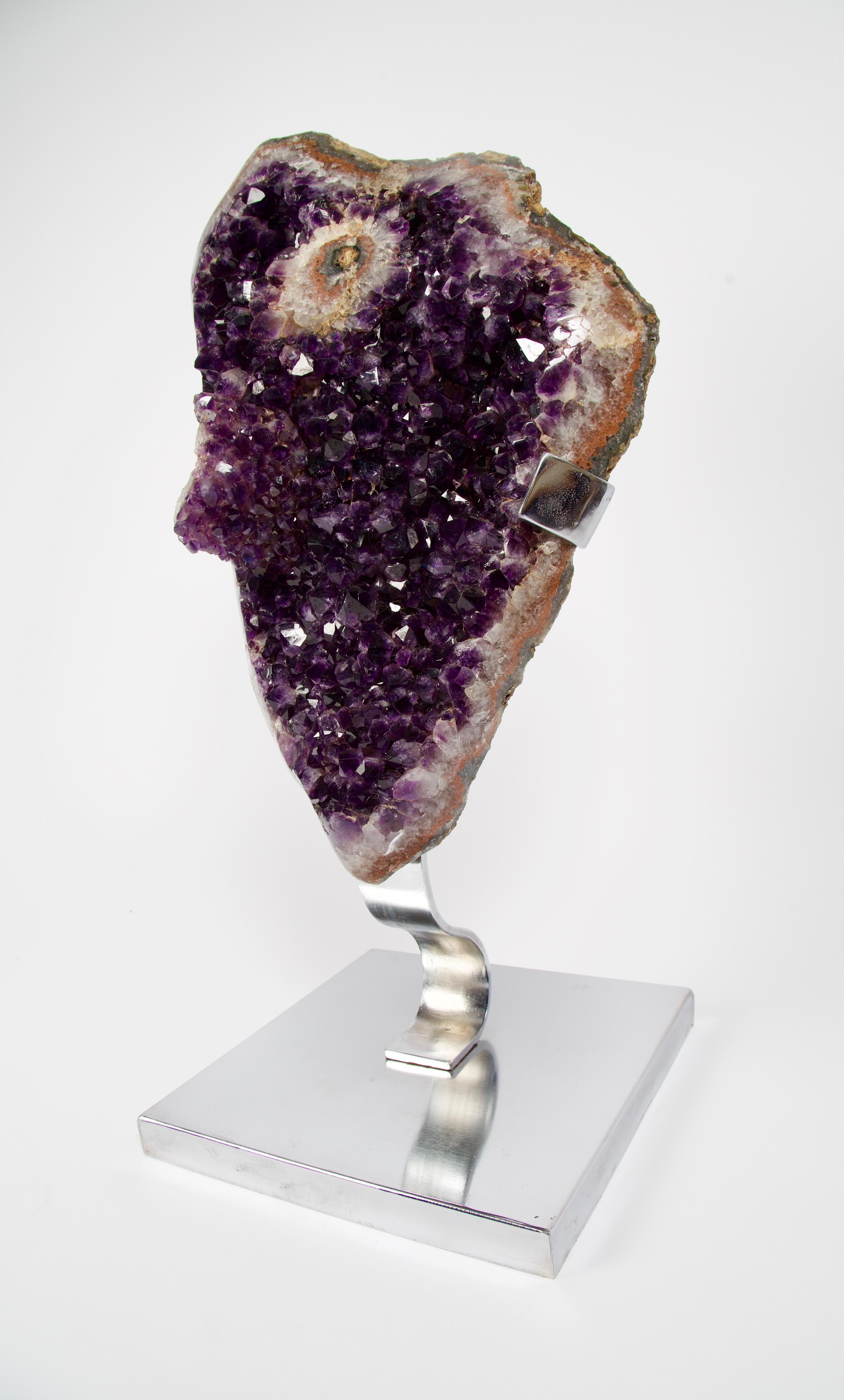 Gem grade, Amethyst Geode Sculpture
The amethyst geodes from Uruguay are mined from the same rock formation as their relatives just to the north across the border into southern Brazil and are igneous (volcanic) in origin. Uruguay amethyst, however,