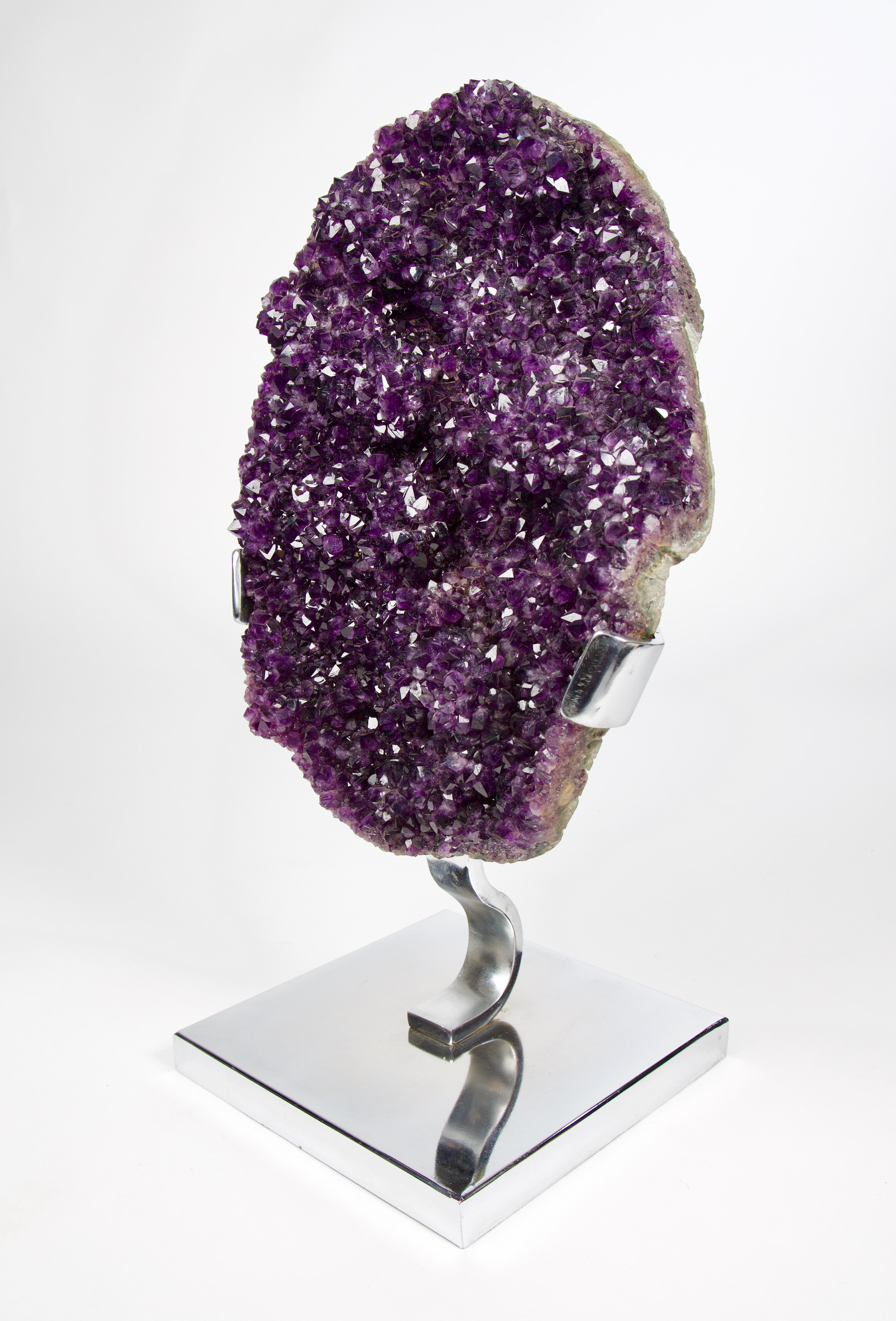 The amethyst geodes from Uruguay are mined from the same rock formation as their relatives just to the north across the border into southern Brazil and are igneous (volcanic) in origin. Uruguay amethyst, however, can usually be differentiated from