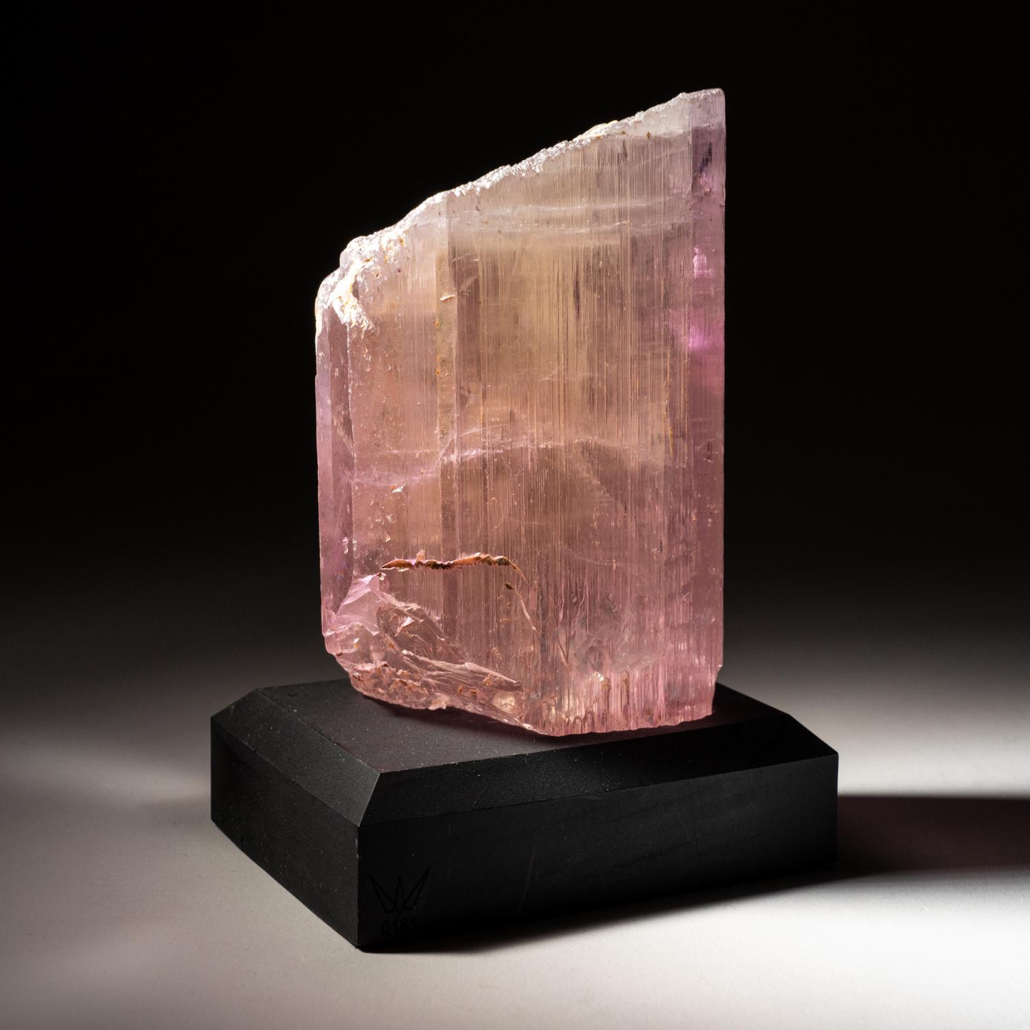 Fully terminated transparent gem quality spodumene var. kunzite with intense vibrant pink color all throughout the crystals. The crystal faces are deeply striated with a glassy luster. Vibrant pink color at its c-axis. Damage free. Custom base