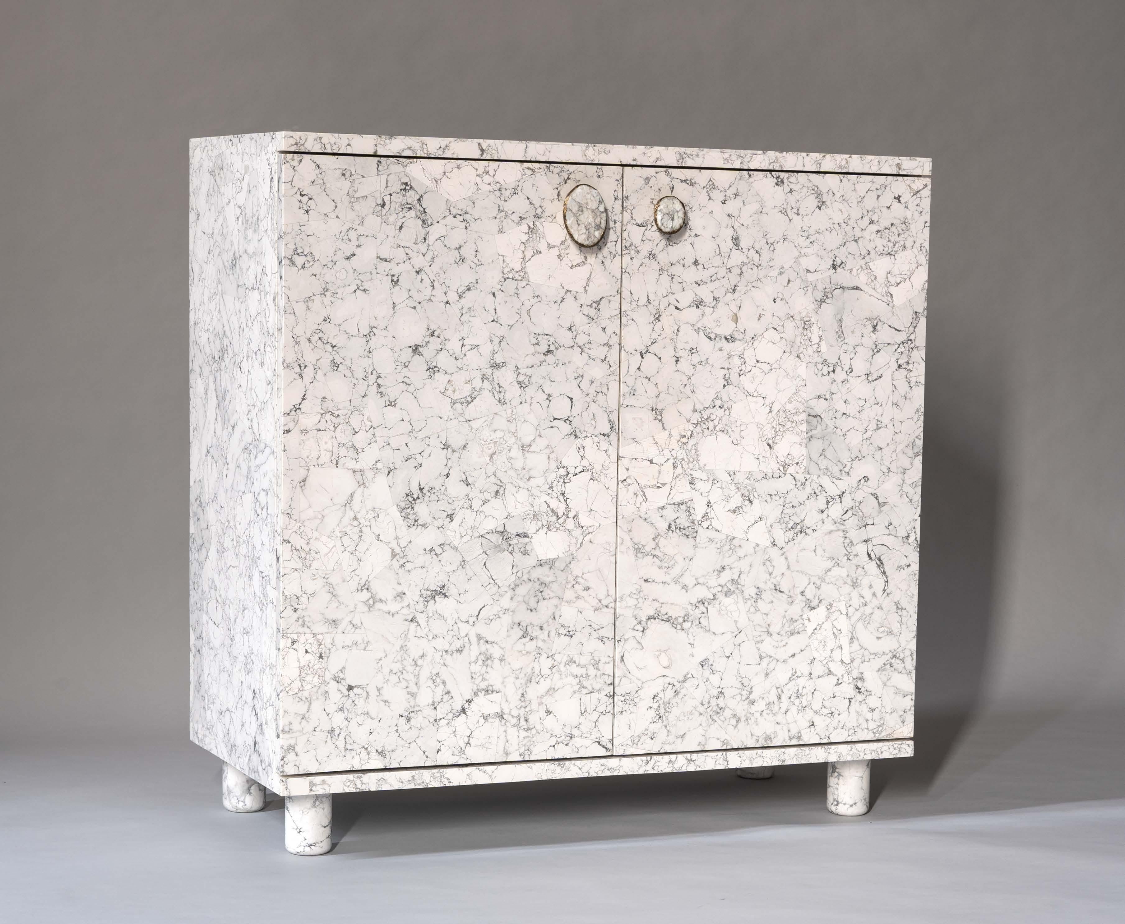 Part of our Gem Collection, the Gem Low Cabinet celebrates the beauty and variety of natural stone. The cabinet is fully encased in semi-precious stone marquetry, its linearity of form contrasted with irregularly shaped hand-cast solid antique