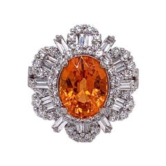 Bague Sunburst en or avec grenat mandarin et diamants, pierre précieuse