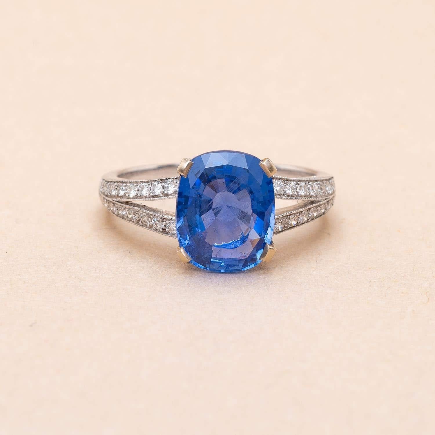 18K white gold oval-cut sapphire and diamond ring. 
The oval-cut sapphire is certified by Gem Paris 
Weight of the sapphire : 3.66 carats 
Perfect condition
Never worn 
Ring size (adjustable on demand) : 54 FR 
Gross weight :