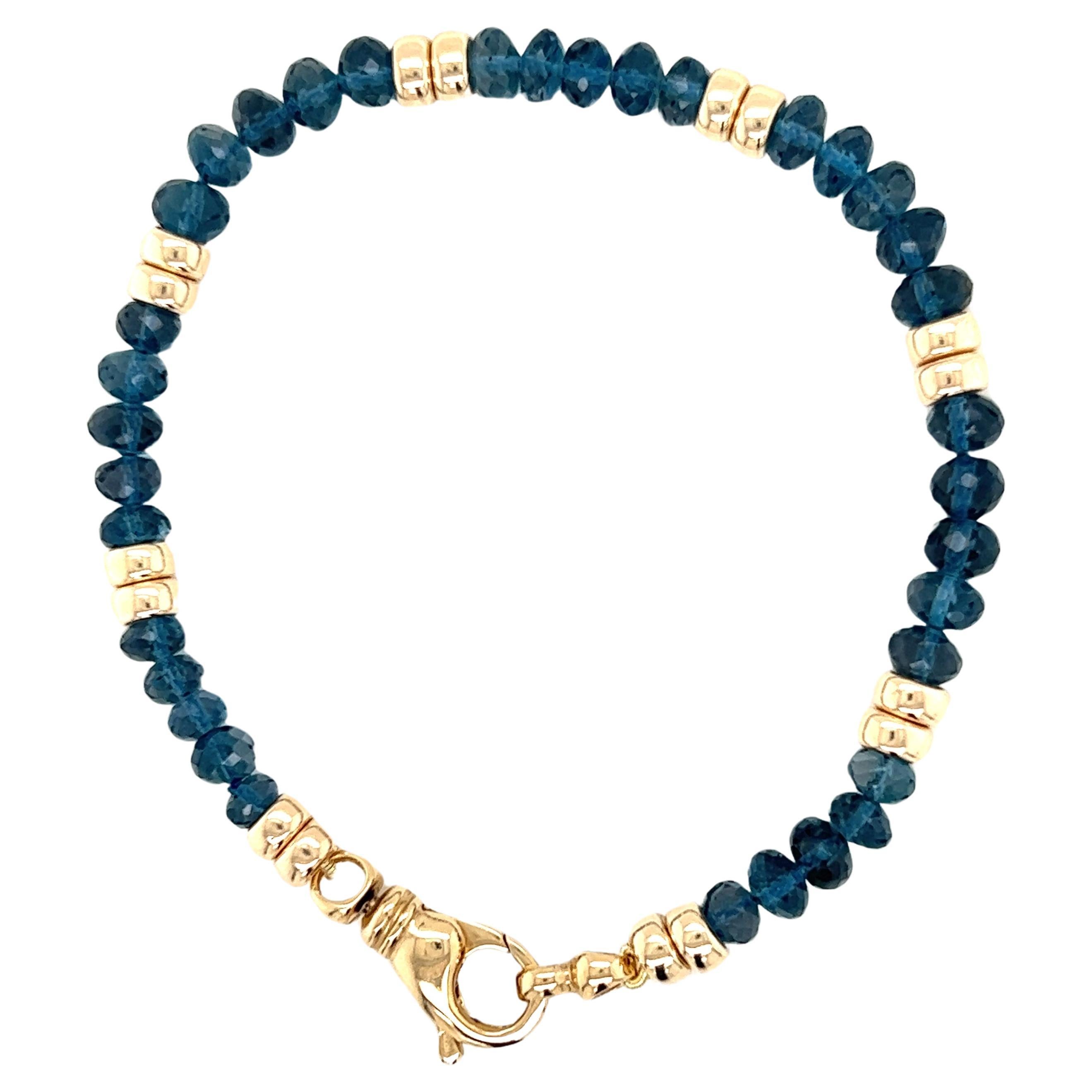 Gem Quality Blue Topaz and 14k Yellow Gold Bead Bracelet  For Sale