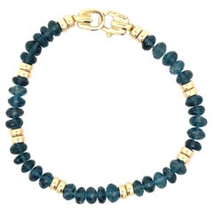 Pulsera de topacio azul de calidad gema y cuentas de oro amarillo de 14k