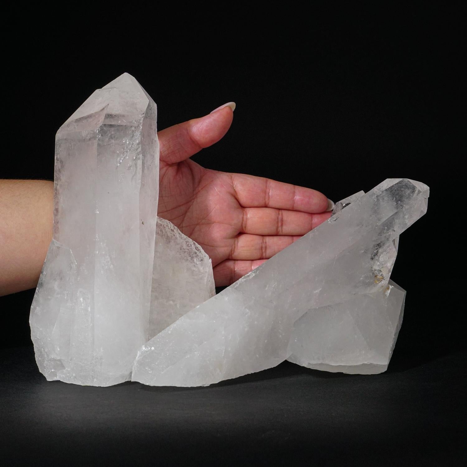 High quality Brazilian Quartz point Crystal Cluster. This translucent crystal cluster has fully terminated quartz point crystals with lustrous highly reflective faces. 

Clear Quartz encourages clarity of thought and purpose to one’s heart and mind.